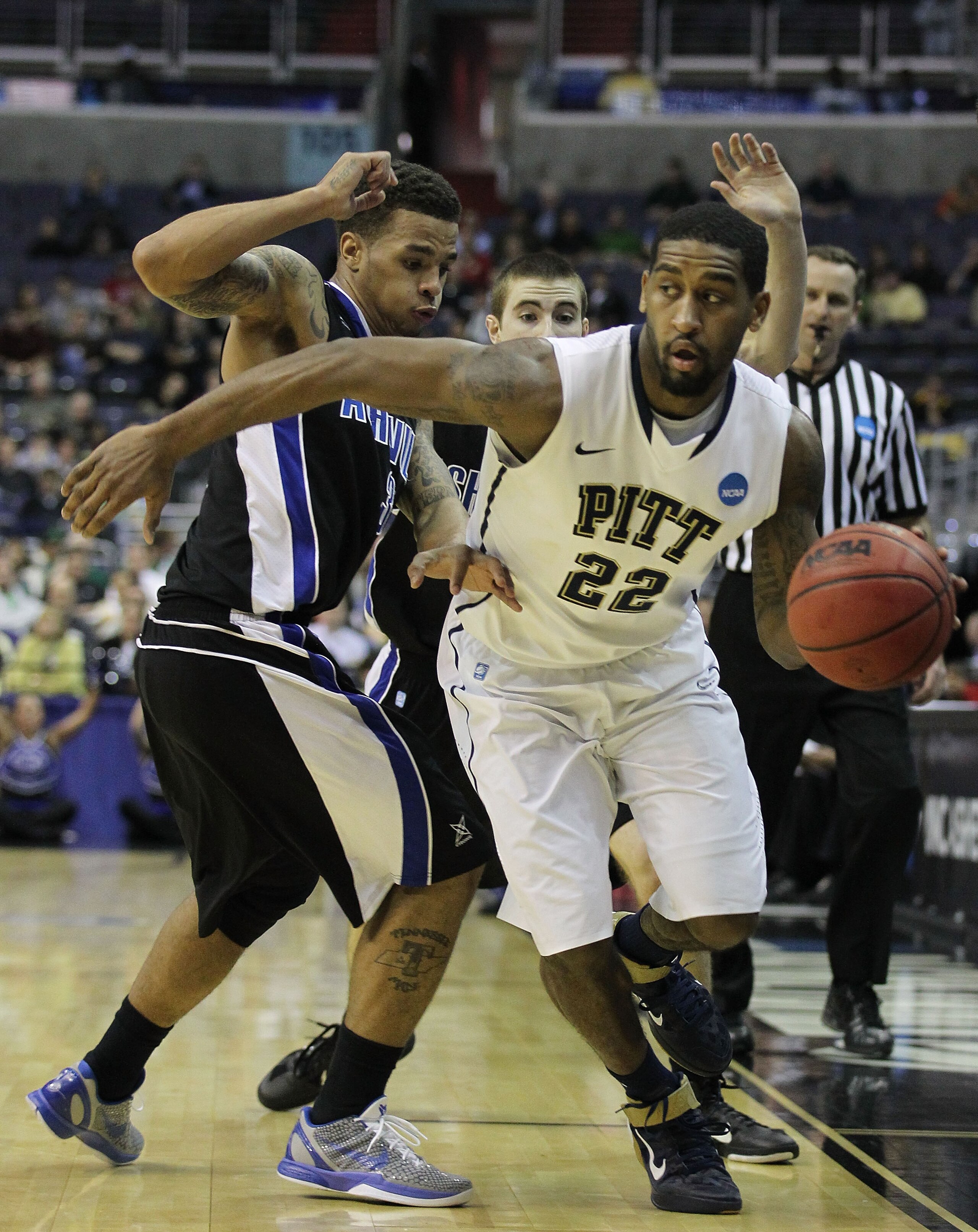 WASHINGTON - MARCH 17: Brad Wanamaker #22 of the Pittsburgh Panthers drives past J.P. Primm #3 of the North Carolina-Asheville Bulldogs during the second round of the 2011 NCAA men's basketball tournament at the Verizon Center on March 17, 2011 in Washin WASHINGTON - MARCH 17: Brad Wanamaker #22 of the Pittsburgh Panthers drives past J.P. Primm #3 of the North Carolina-Asheville Bulldogs during the second round of the 2011 NCAA men's basketball tournament at the Verizon Center on March 17, 2011 in Washin