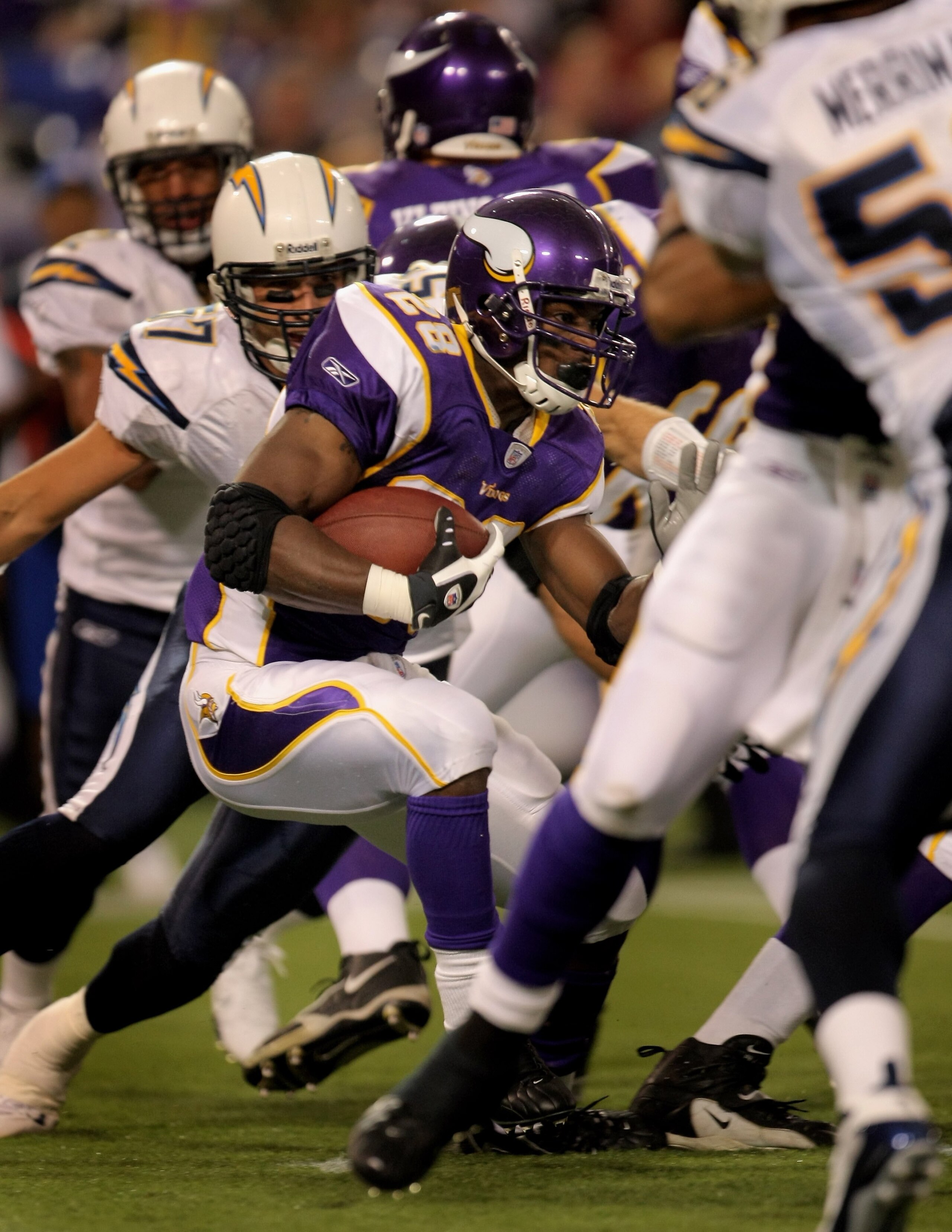MINNEAPOLIS, MN - NOVEMBER 04:  Adrian Peterson #28 of the Minnesota Vikings runs the ball as he set two NFL records against the San Diego Chargers at the Hubert H. Humphrey Metrodome on November 4, 2007 in Minneapolis, Minnesota. Peterson rushed for 296
