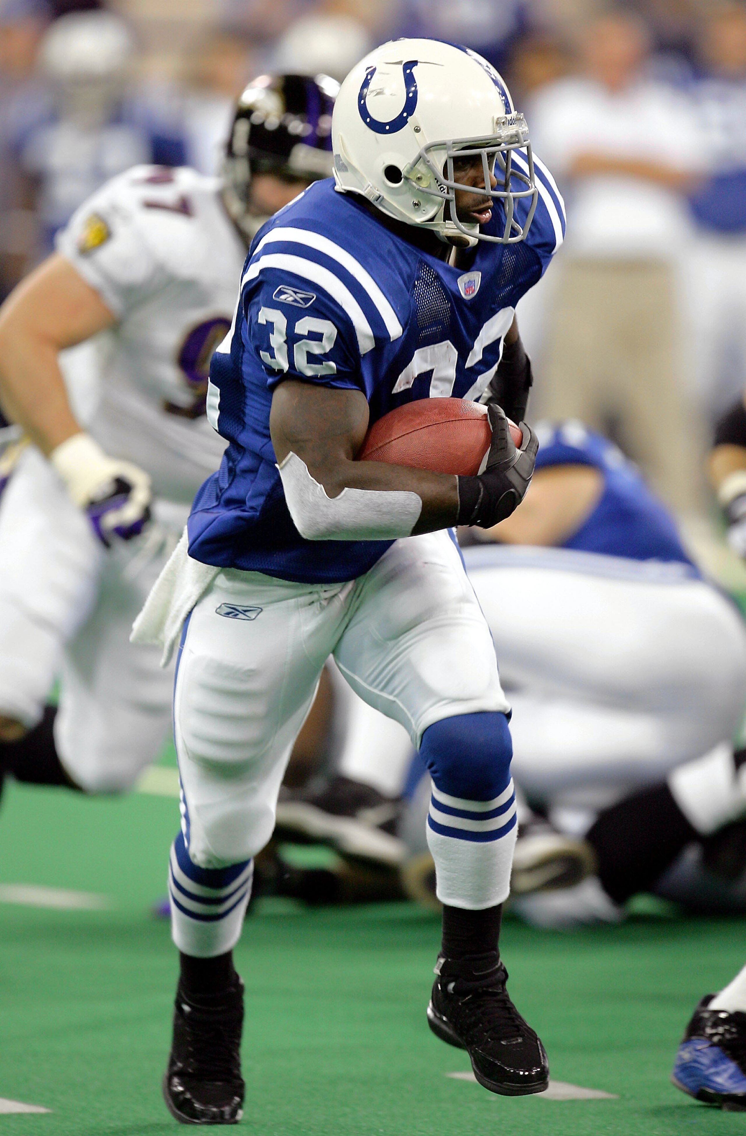 INDIANAPOLIS, IN - DECEMBER 19:  Running back Edgerrin James #32 of the Indianapolis Colts runs the ball against the Baltimore Ravens on December 19, 2004 at the RCA Dome in Indianapolis, Indiana.  (Photo by Ronald Martinez/Getty Images)