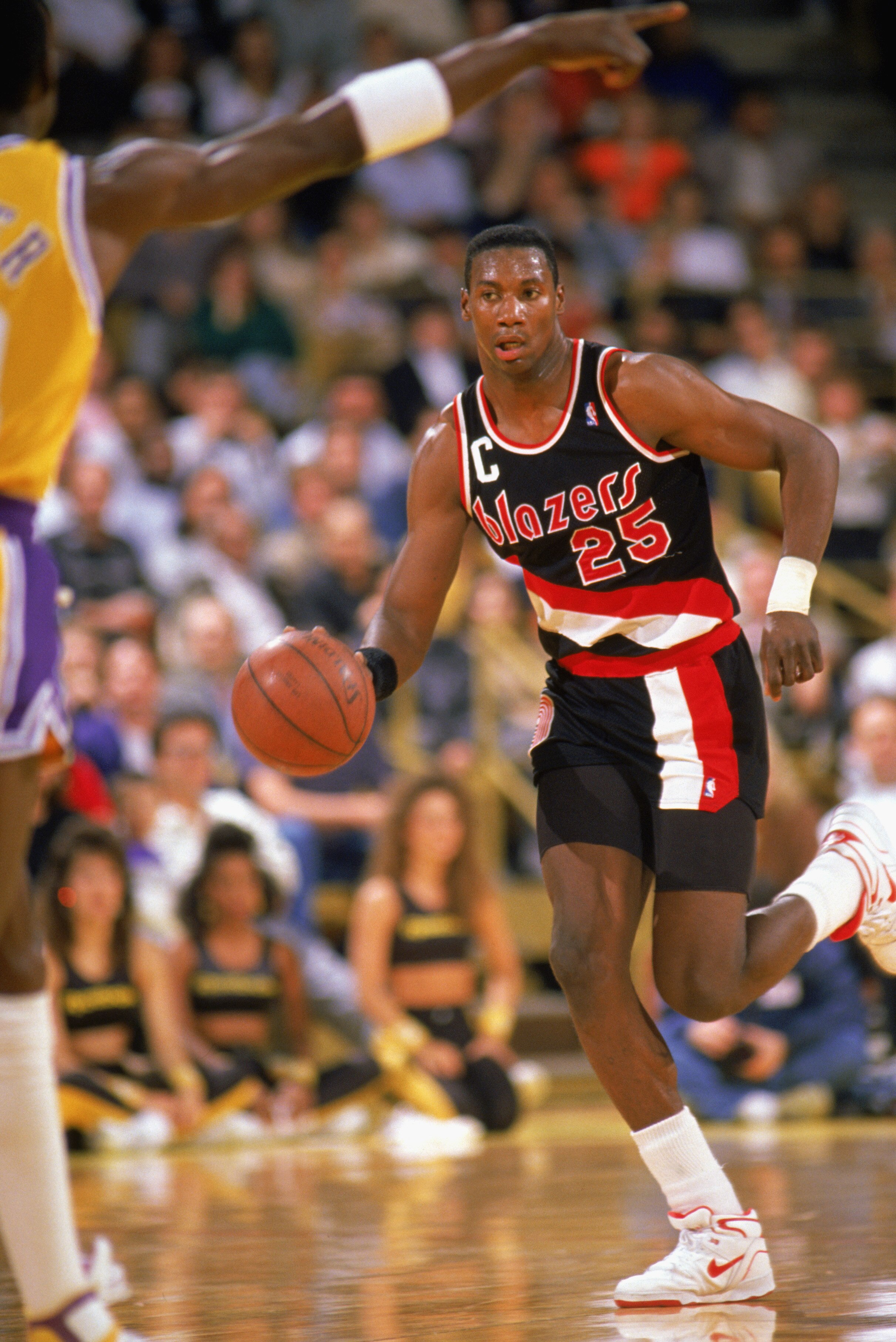 LOS ANGELES - 1988:  Jerome Kersey #25 of the Portland Trail Blazers drives against the Los Angeles Lakers during the 1988-1989 NBA season game at the Great Western Forum in Los Angeles, California.  (Photo by Mike Powell/Getty Images)