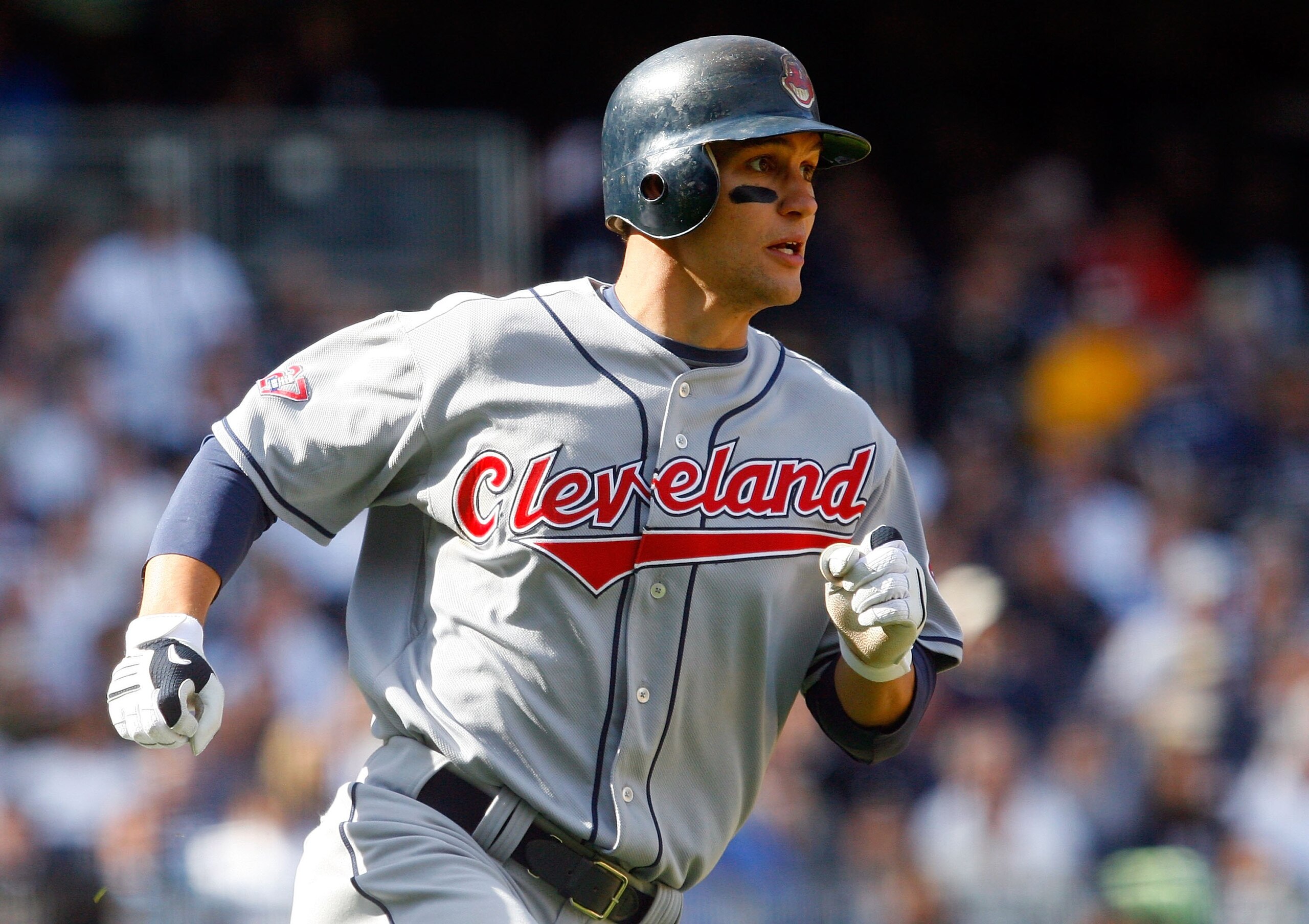NEW YORK - APRIL 16:  Grady Sizemore #24 of the Cleveland Indians hits a grand slam during the seventh inning on opening day against the New York Yankees at the new Yankee Stadium on April 16, 2009 in the Bronx borough of New York City. This is the first