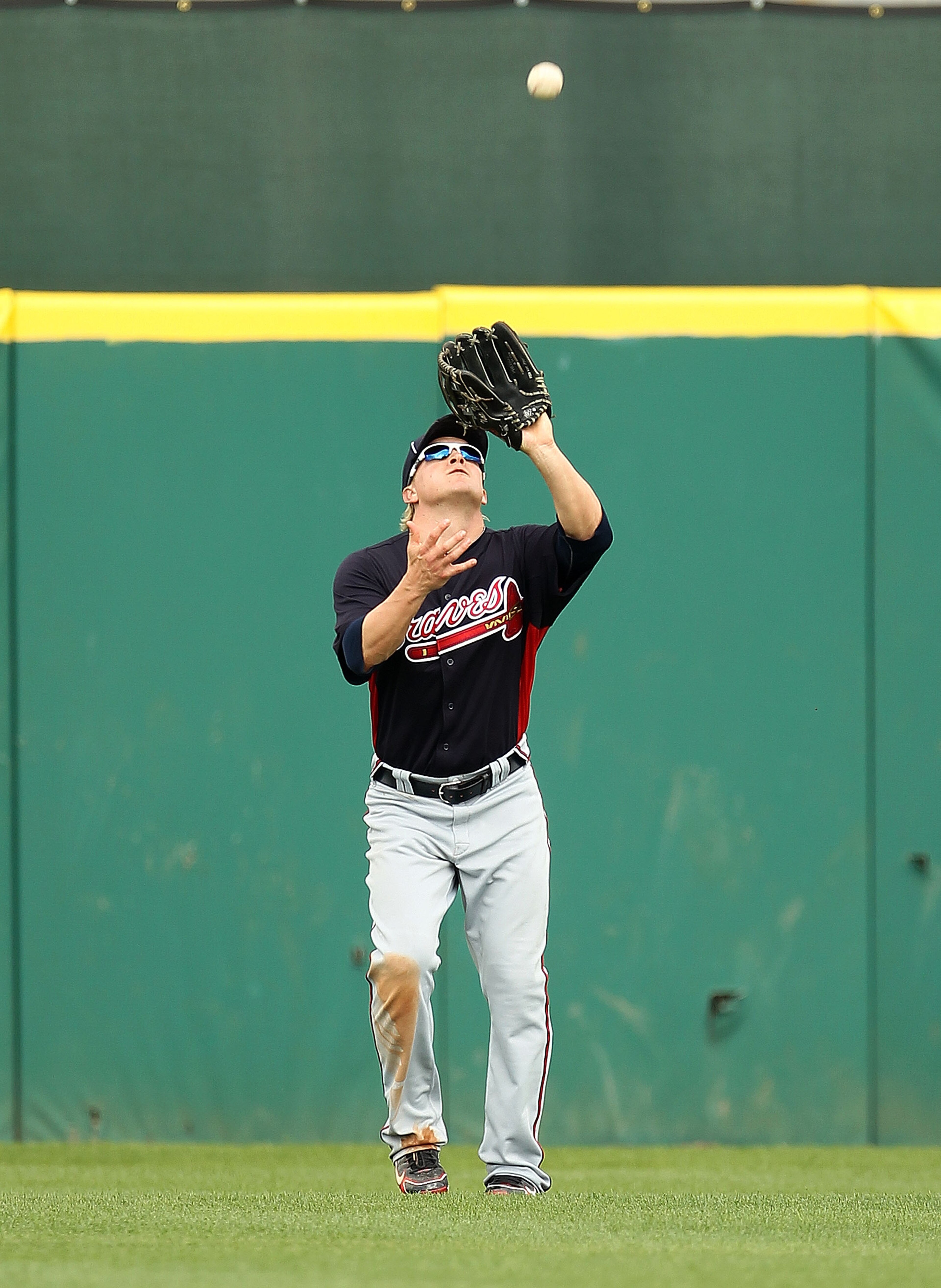 KISSIMMEE, FL - MARCH 01: Nate McLouth #13 of the Atlanta Braves makes a catch during a Spring Training game against the Houston Astros at Osceola County Stadium on March 1, 2011 in Kissimmee, Florida. (Photo by Mike Ehrmann/Getty Images) KISSIMMEE, FL - MARCH 01: Nate McLouth #13 of the Atlanta Braves makes a catch during a Spring Training game against the Houston Astros at Osceola County Stadium on March 1, 2011 in Kissimmee, Florida. (Photo by Mike Ehrmann/Getty Images)