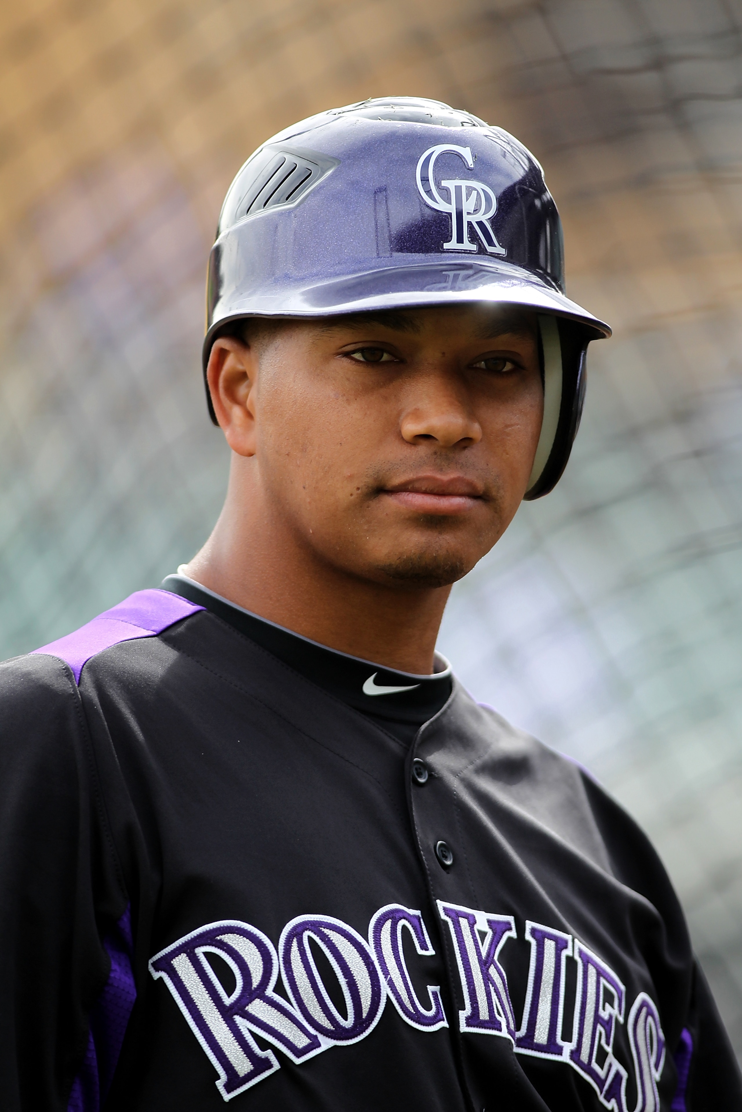 SCOTTSDALE, AZ - FEBRUARY 26:  Jose Lopez #22 of the Colorado Rockies watches batting practice before the game against the Arizona Diamondbacks at Salt River Fields on February 26, 2011in Scottsdale, Arizona..  (Photo by Jonathan Ferrey/Getty Images)