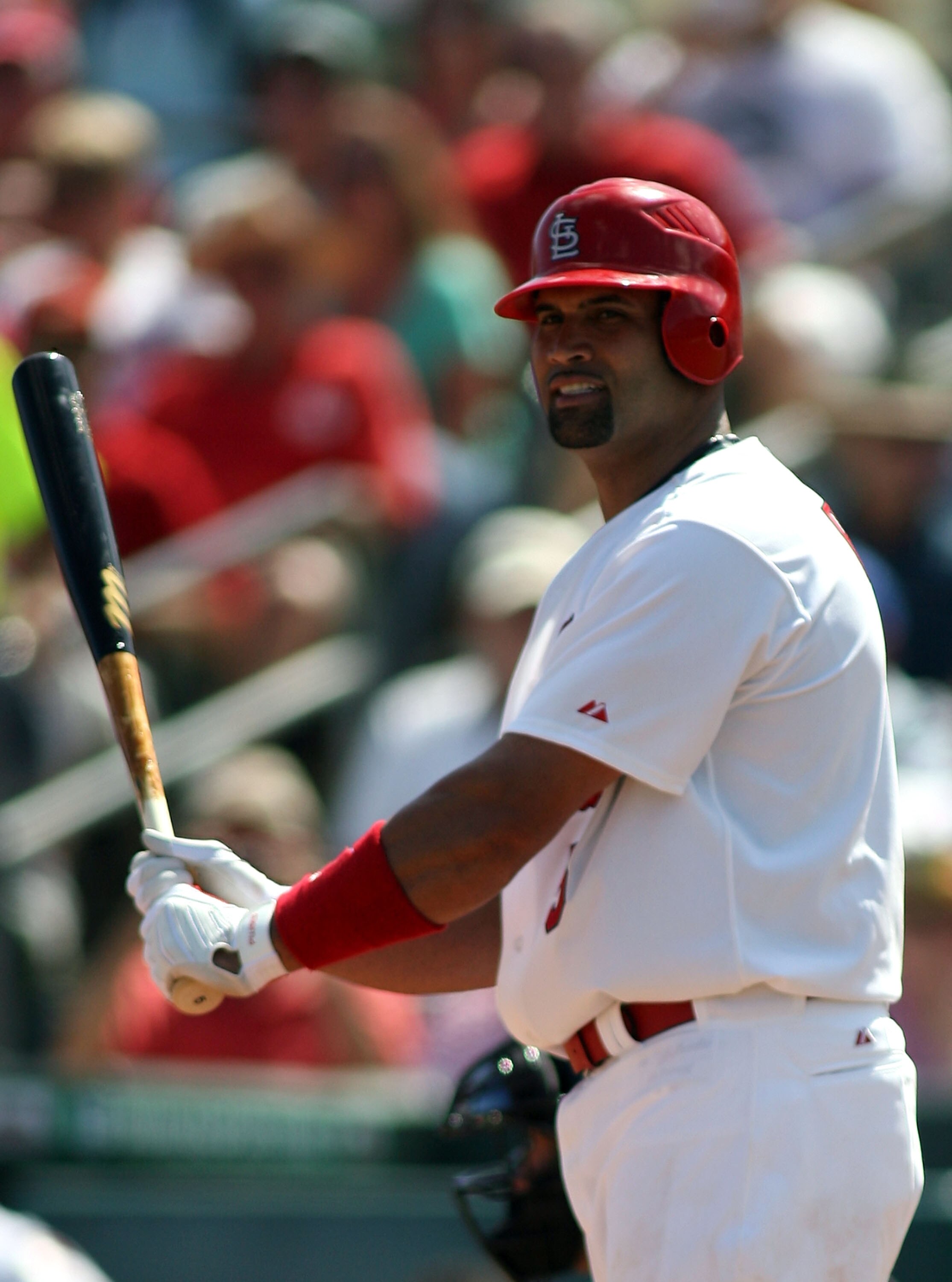 JUPITER, FL - FEBRUARY 28:  Albert Pujols #5 of the St. Louis Cardinals prepares to swing against the Florida Marlins at Roger Dean Stadium on February 28, 2011 in Jupiter, Florida.  (Photo by Marc Serota/Getty Images)