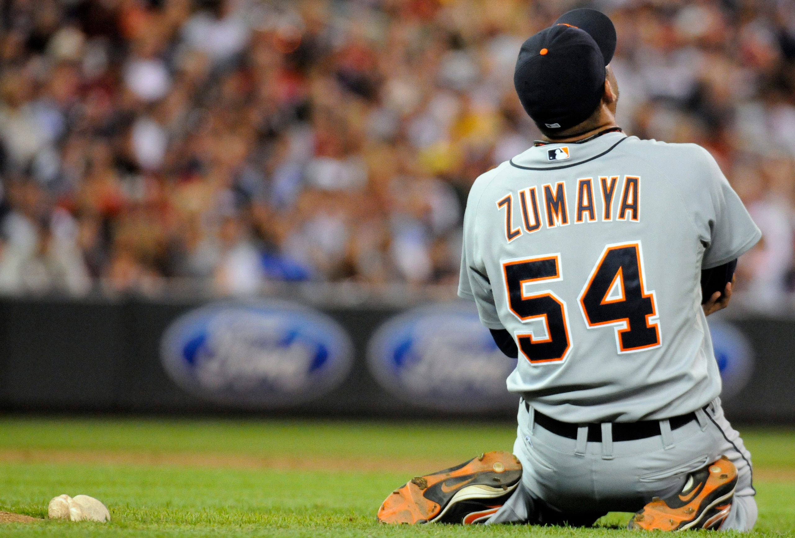 MINNEAPOLIS, MN - JUNE 28:  Joel Zumaya #54 of the Detroit Tigers clutches his elbow after falling to the ground in the eighth inning against the Minnesota Twins during their game on June 28, 2010 at Target Field in Minneapolis, Minnesota. Zumaya left the
