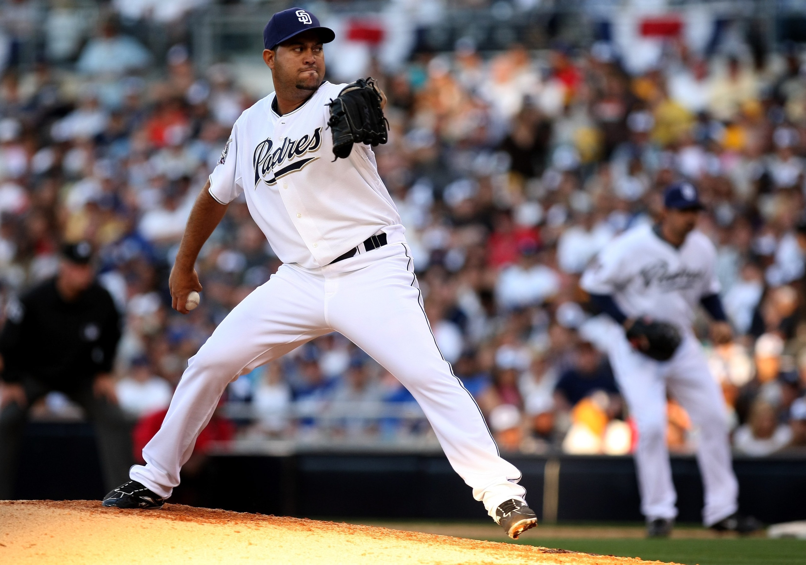 SAN DIEGO - APRIL 06: Pitcher Edward Mujica #45 of the San Diego Padres throws a pitch against the Los Angeles Dodgers on April 6, 2009 at Petco Park in San Diego, California. The Dodgers won 4-1. (Photo by Stephen Dunn/Getty Images) SAN DIEGO - APRIL 06: Pitcher Edward Mujica #45 of the San Diego Padres throws a pitch against the Los Angeles Dodgers on April 6, 2009 at Petco Park in San Diego, California. The Dodgers won 4-1. (Photo by Stephen Dunn/Getty Images)