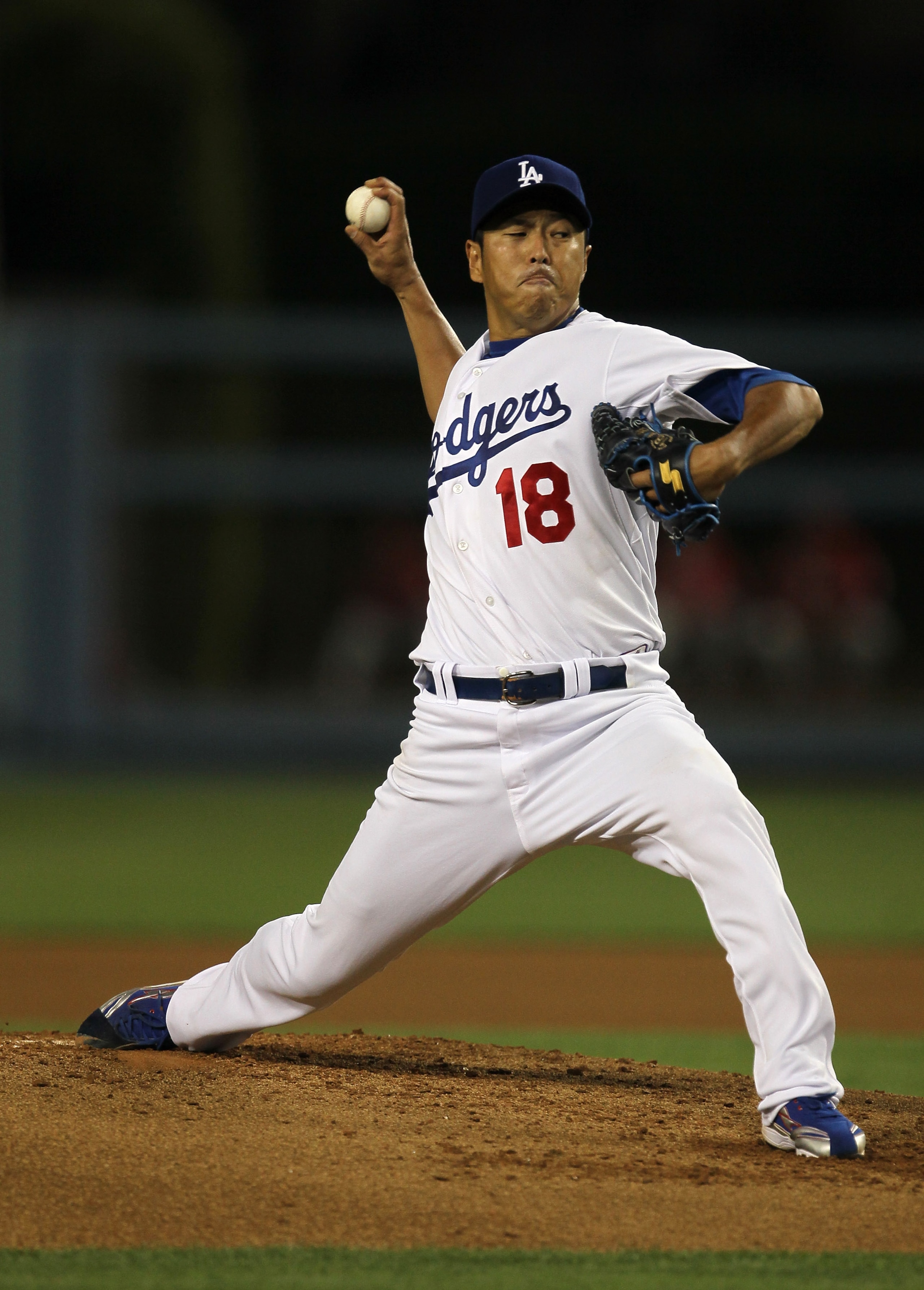 LOS ANGELES, CA - AUGUST 30: Hiroki Kuroda #18 of the Los Angeles Dodgers throws a pitch against the Philadelphia Phillies on August 30, 2010 at Dodger Stadium in Los Angeles, California. (Photo by Stephen Dunn/Getty Images) LOS ANGELES, CA - AUGUST 30: Hiroki Kuroda #18 of the Los Angeles Dodgers throws a pitch against the Philadelphia Phillies on August 30, 2010 at Dodger Stadium in Los Angeles, California. (Photo by Stephen Dunn/Getty Images)