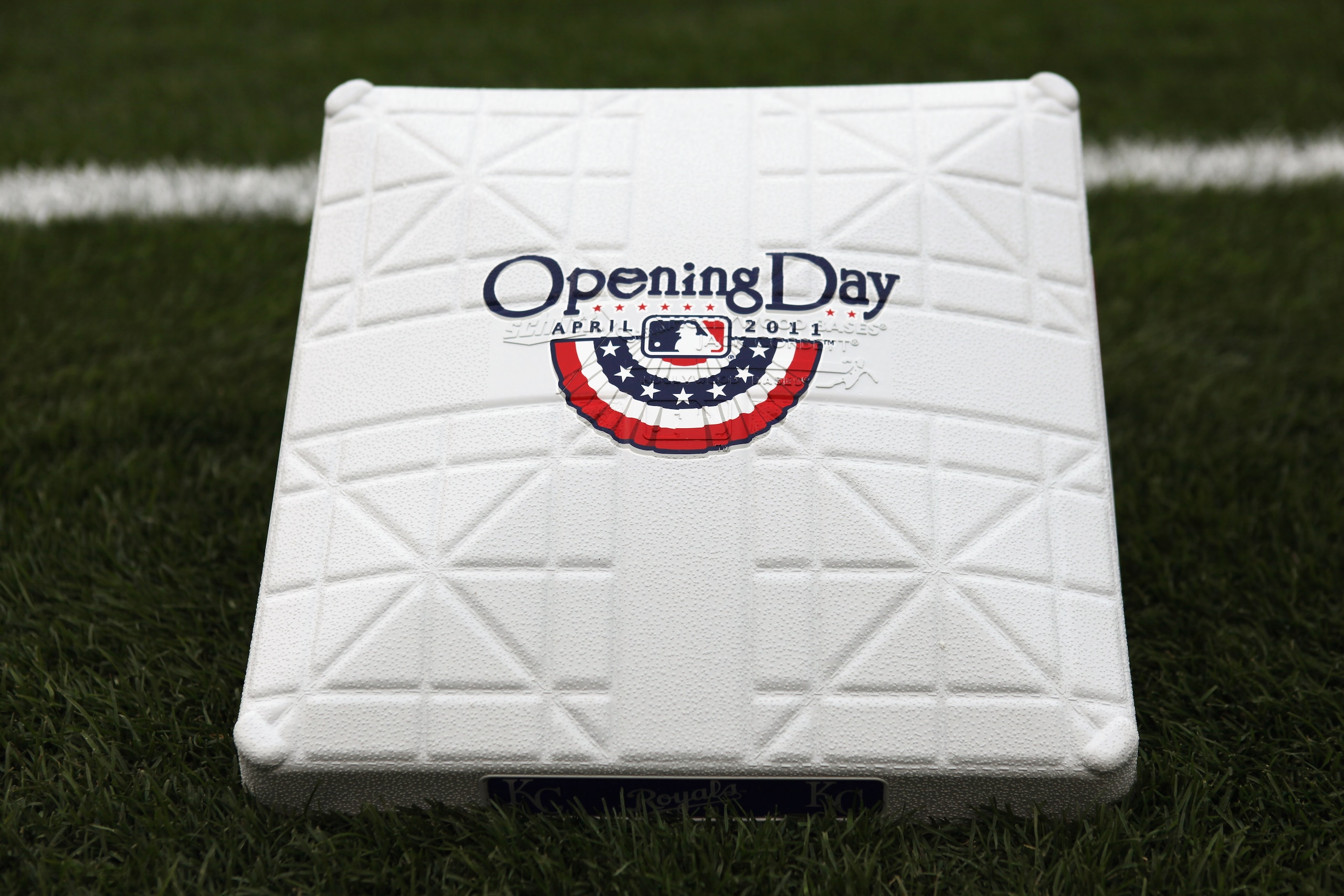 KANSAS CITY, MO - MARCH 31:  A base displays an Opening Day logo prior to the start of the opening day game between the Los Angeles Angels of Anaheim and the Kansas City Royals at Kauffman Stadium on March 31, 2011 in Kansas City, Missouri.  (Photo by Jam