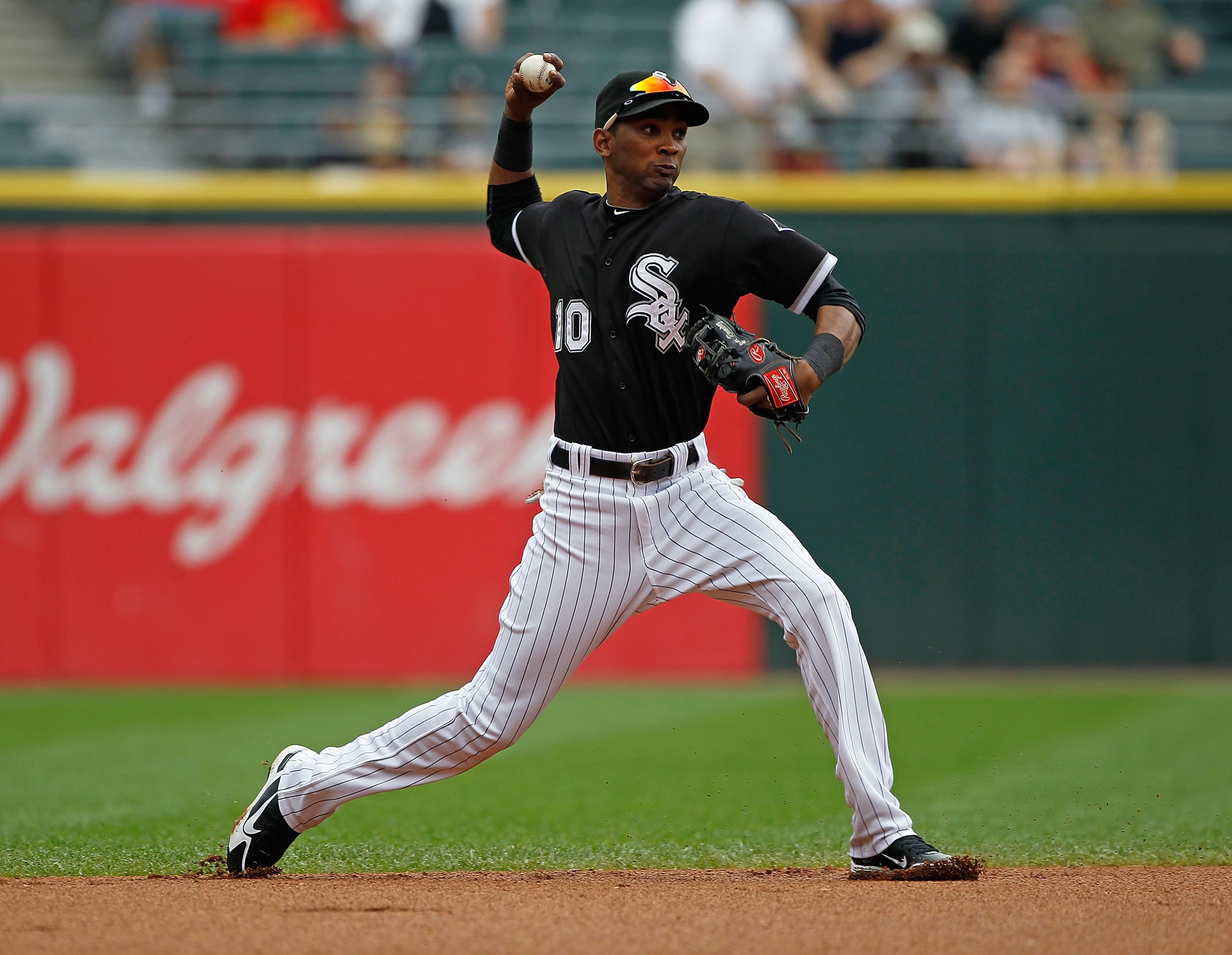 CHICAGO - JUNE 10: Alexei Ramirez #10 of the Chicago White Sox throws the ball to 1st base against the Detriot Tigers at U.S. Cellular Field on June 10, 2010 in Chicago, Illinois. The White Sox defeated the Tigers 3-0. (Photo by Jonathan Daniel/Getty Imag