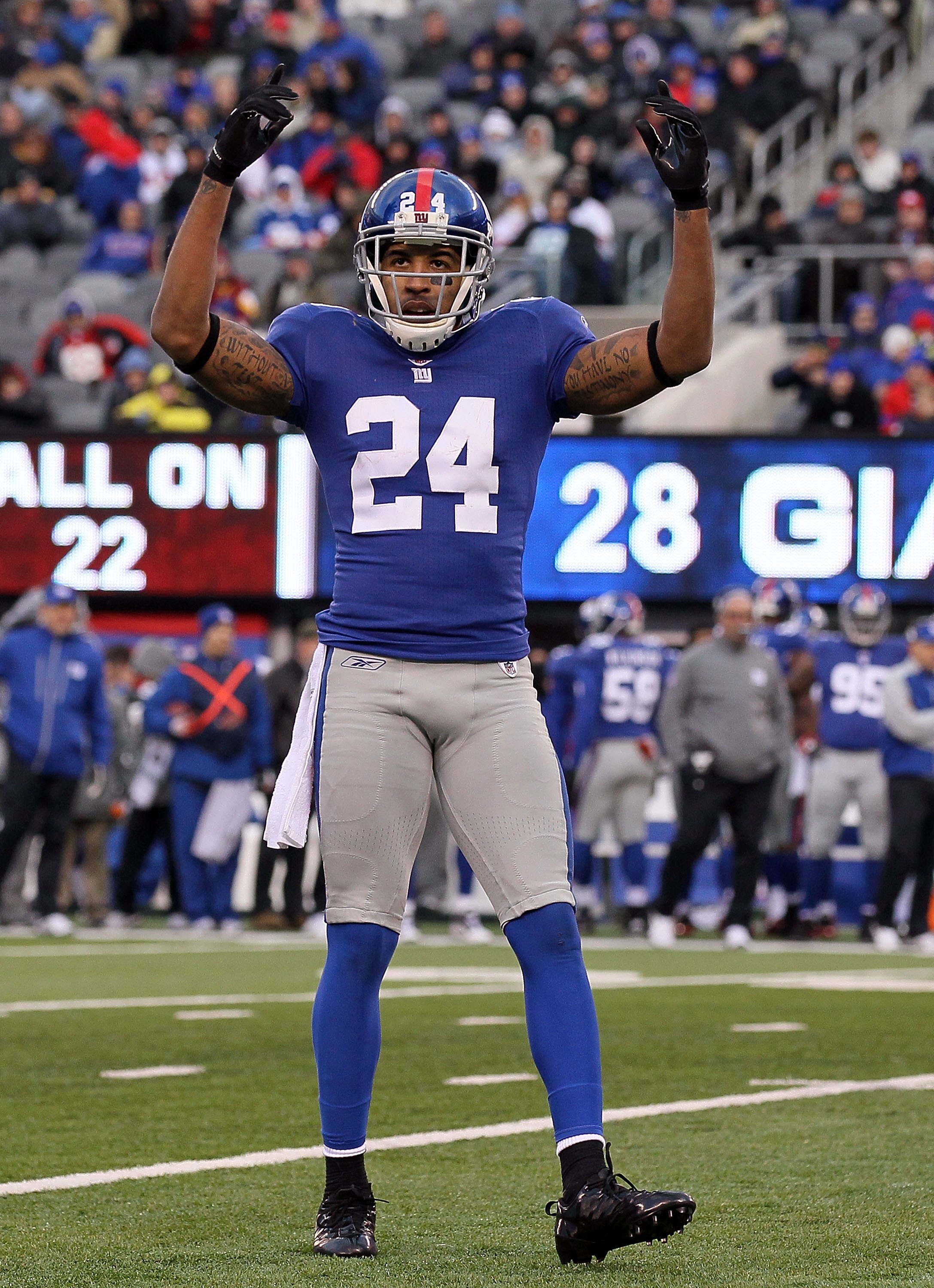 EAST RUTHERFORD, NJ - DECEMBER 05:  Terrell Thomas #24 of the New York Giants fires up the crowd against the Washington Redskins on December 5, 2010 at the New Meadowlands Stadium in East Rutherford, New Jersey. The Giants defeated the Redskins 31-7.  (Ph