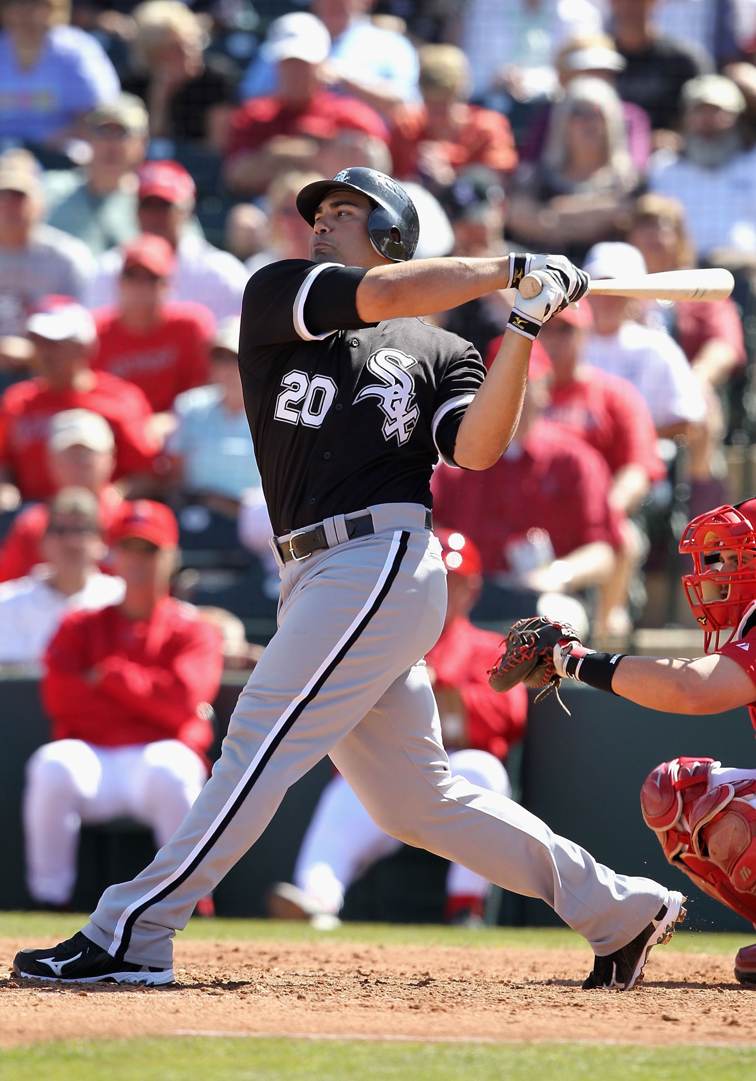 TEMPE, AZ - MARCH 12:  Carlos Quentin #20 of the Chicago White Sox bats against the Los Angeles Angels of Anaheim during the MLB spring training game at Tempe Diablo Stadium on March 12, 2010 in Tempe, Arizona.  (Photo by Christian Petersen/Getty Images)