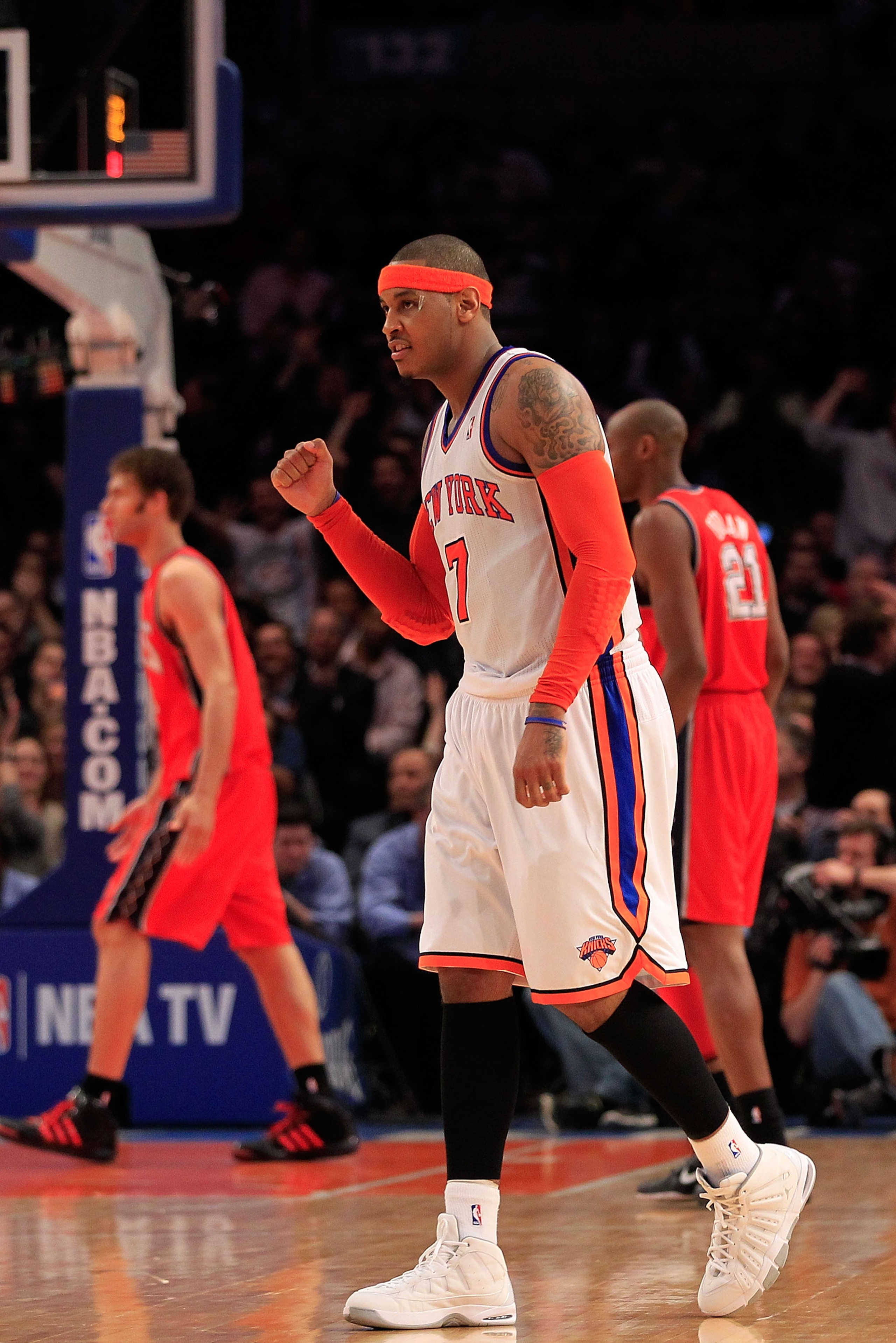 NEW YORK, NY - MARCH 30:  Carmelo Anthony #7 of the New York Knicks celebrates during the game against the New Jersey Nets at Madison Square Garden on March 30, 2011 in New York City. NOTE TO USER: User expressly acknowledges and agrees that, by downloadi
