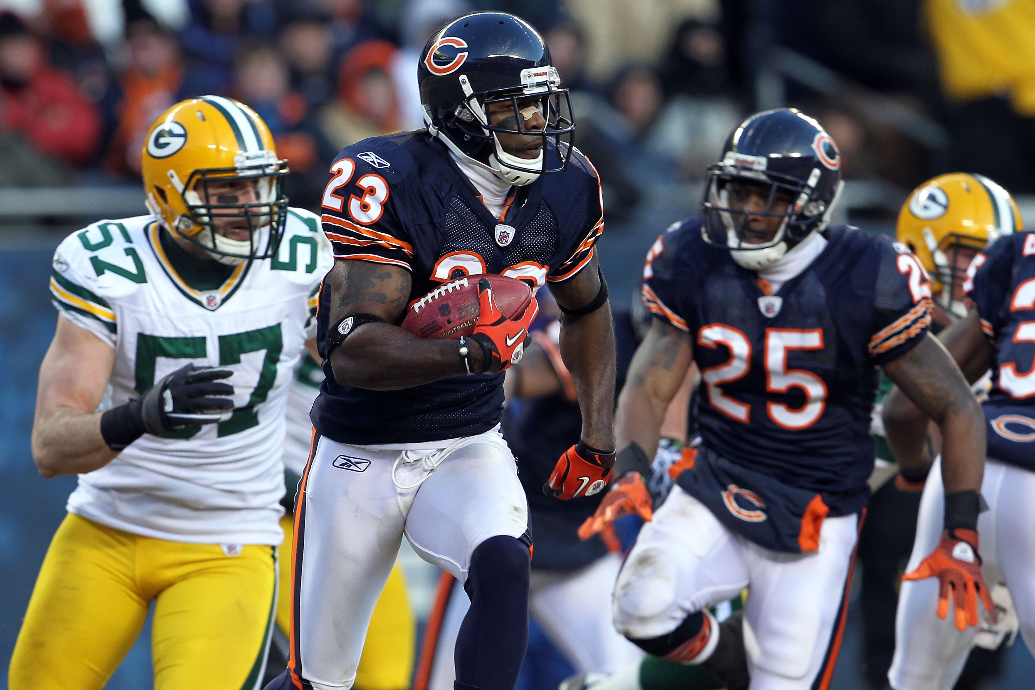 CHICAGO, IL - JANUARY 23:  Devin Hester #23 of the Chicago Bears returns a kick against the Green Bay Packers in the NFC Championship Game at Soldier Field on January 23, 2011 in Chicago, Illinois.  (Photo by Jamie Squire/Getty Images)