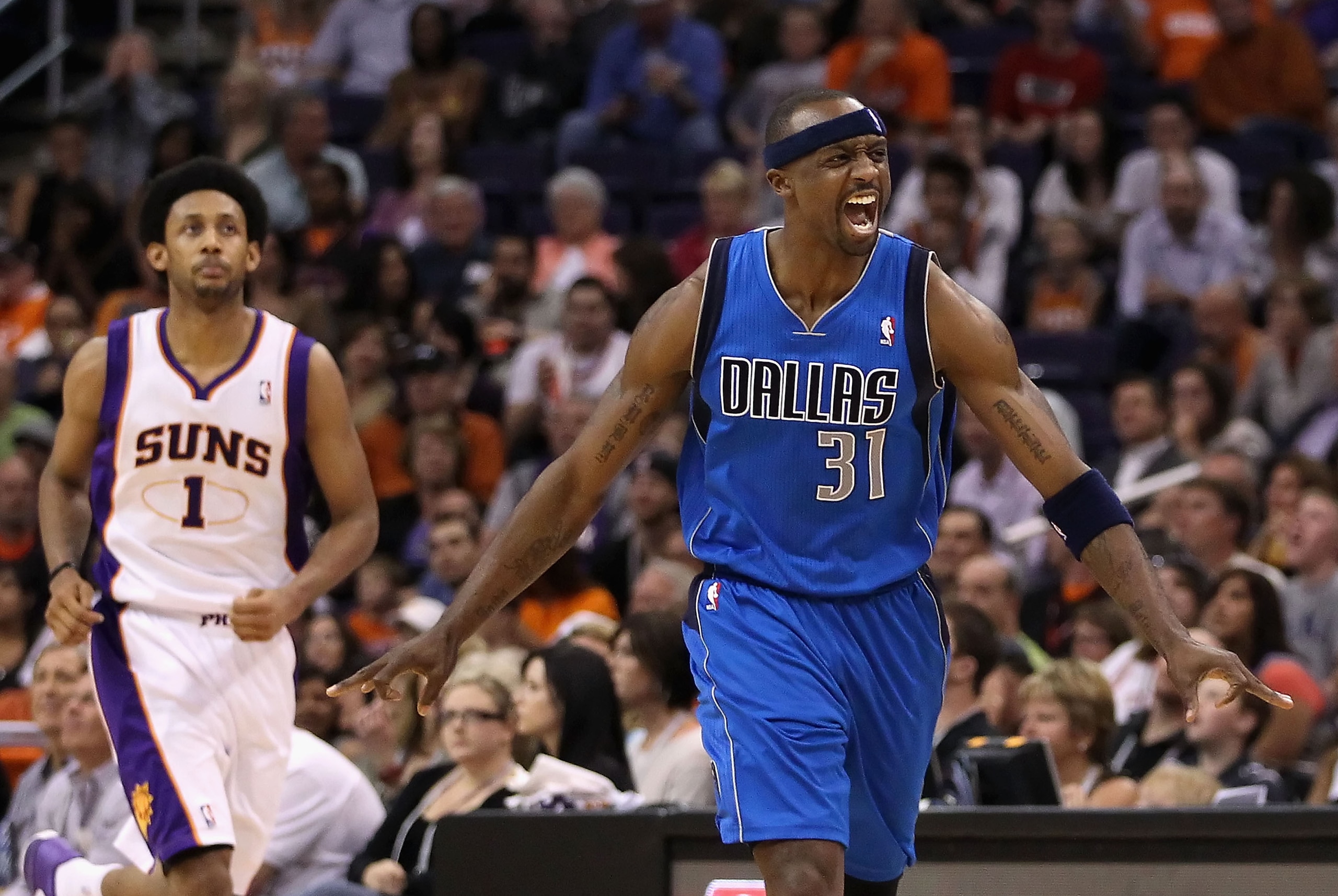 PHOENIX, AZ - MARCH 27:  Jason Terry #31 of the Dallas Mavericks celebrates after hitting a three point shot over Josh Childress #1 of the Phoenix Suns during the NBA game at US Airways Center on March 27, 2011 in Phoenix, Arizona. The Mavericks defeated 