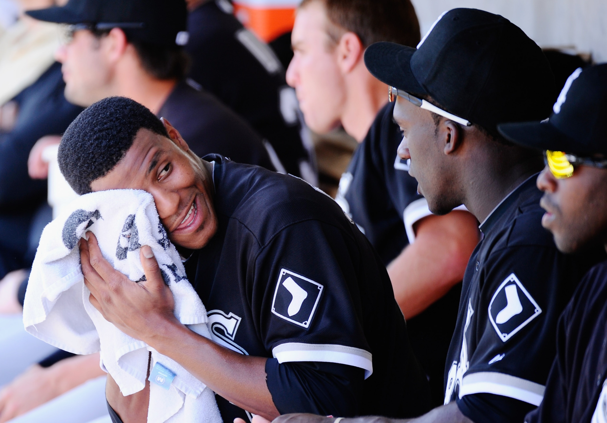 PHOENIX, AZ - MARCH 17:  Pitcher Edwin Jackson #33 of the Chicago White Sox wipes his face after giving four runs to the Milwaukee Brewers during the first inning of the spring training game at Maryvale Baseball Park on March 17, 2011 in Phoenix, Arizona.