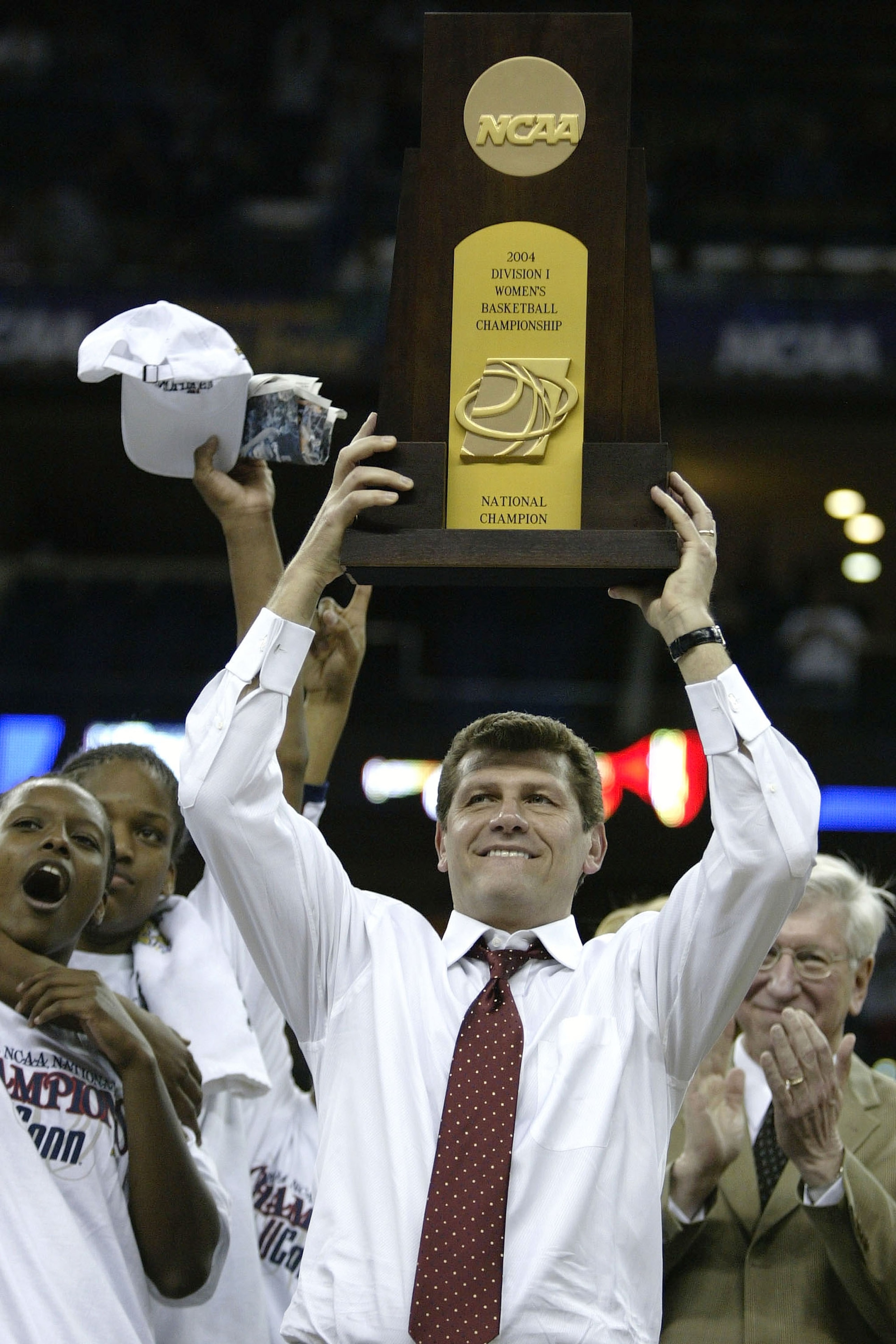 NEW ORLEANS - APRIL 6:  Head coach Geno Auriemma of the University of Connecticut Huskies holds the NCAA National Championship trophy after defeating the Tennessee Lady Vols 70-61 in the National Championship game of the NCAA Women's Final Four Tournament