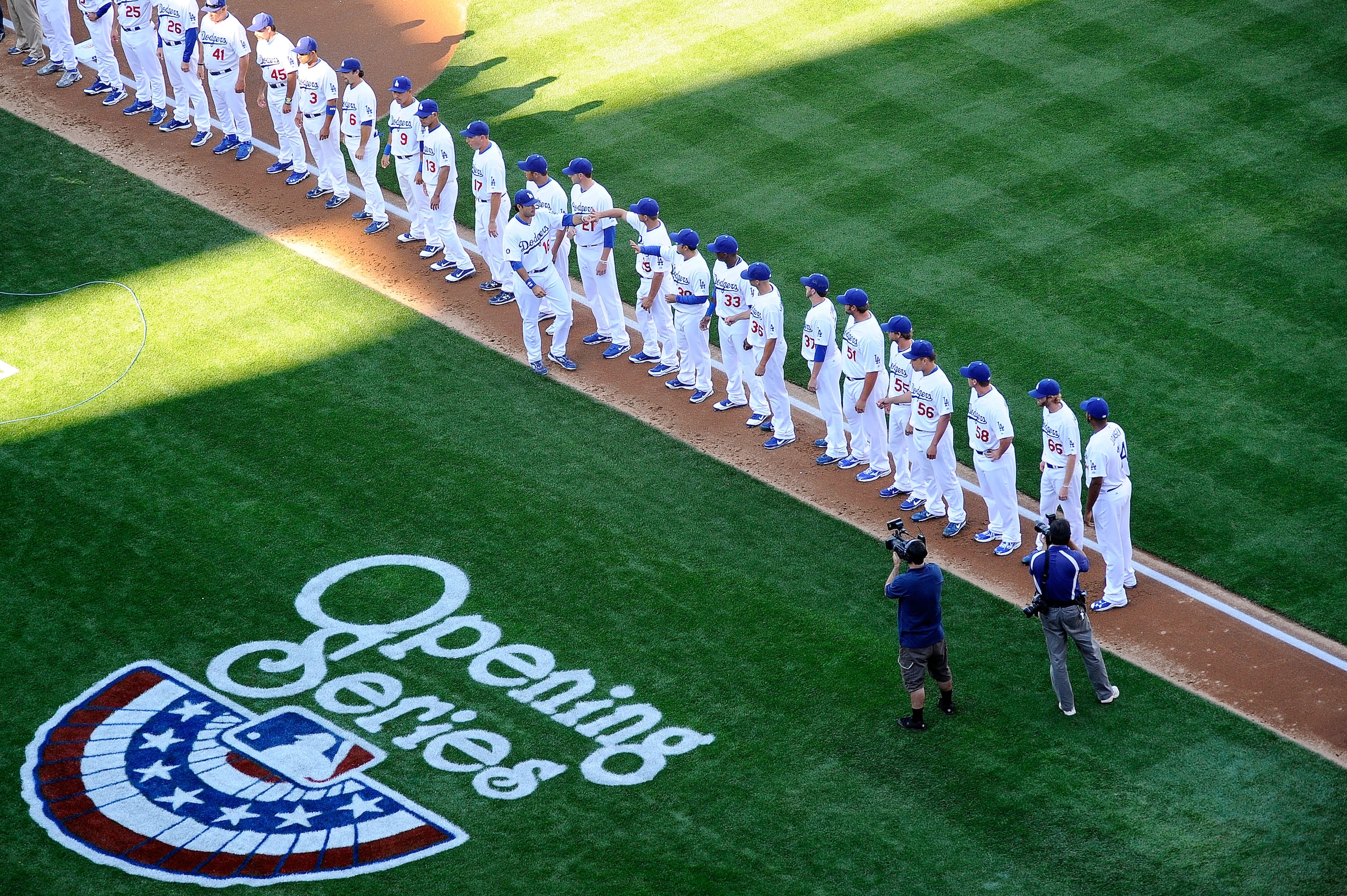 LOS ANGELES, CA - MARCH 31:  Andre Ethier #16 of the Los Angeles Dodgers greets his teammates after being introduced on Opening Day prior to playing the San Francisco Giants at Dodger Stadium on March 31, 2011 in Los Angeles, California.  (Photo by Kevork