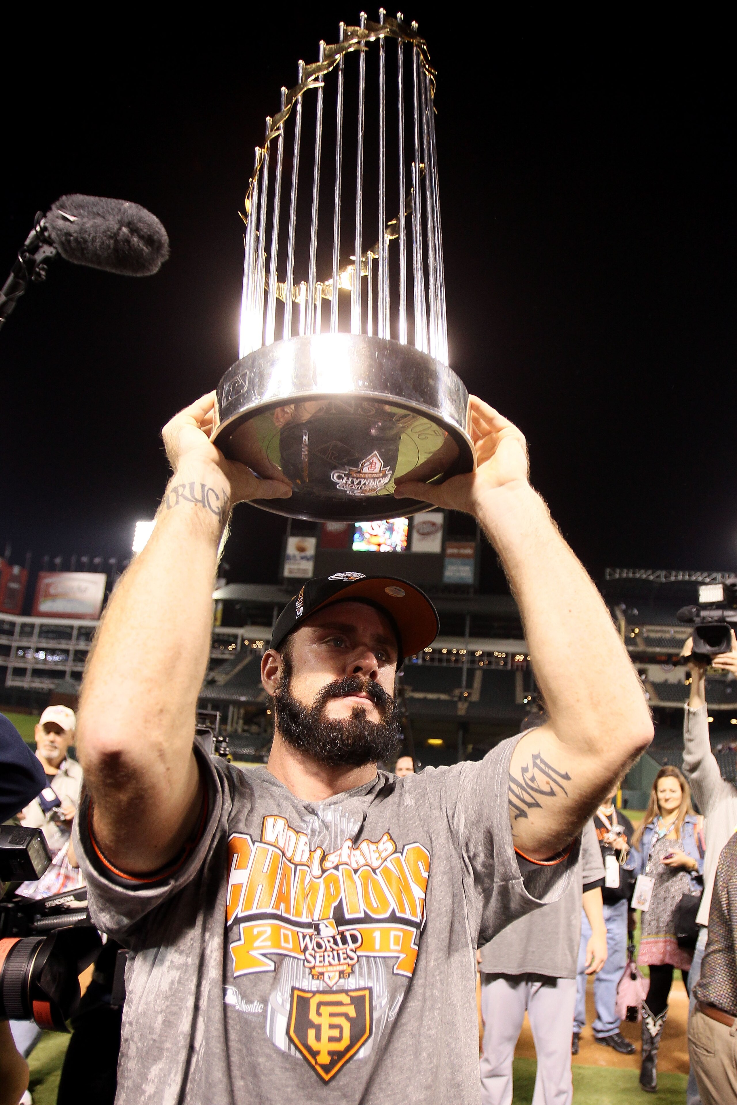 ARLINGTON, TX - NOVEMBER 01:  Brian Wilson #38 of the San Francisco Giants celebrates with the World Series Championship trophy after the Giants won 3-1 the Texas Rangers in Game Five of the 2010 MLB World Series at Rangers Ballpark in Arlington on Novemb