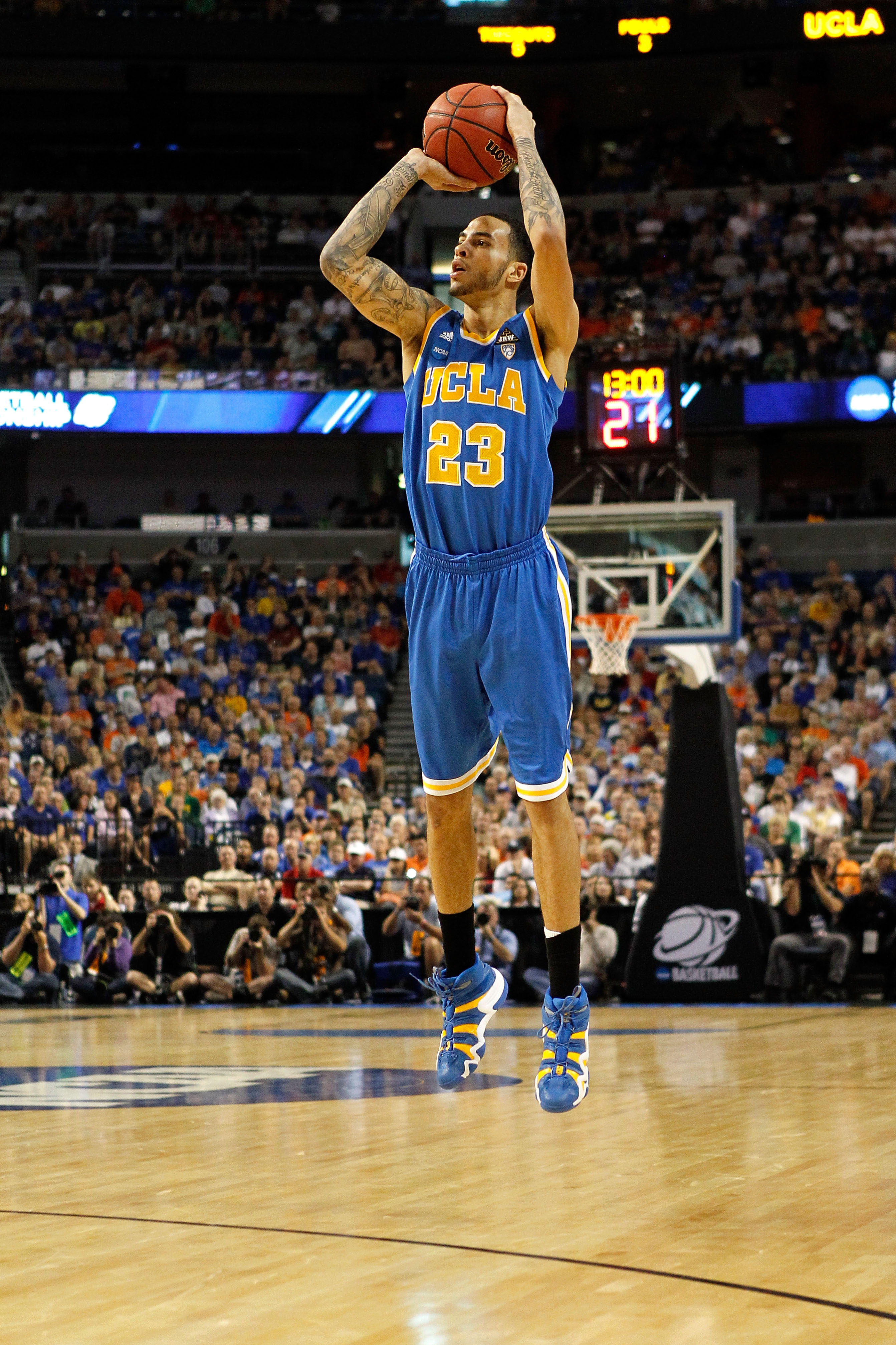 TAMPA, FL - MARCH 19:  Tyler Honeycutt #23 of the UCLA Bruins attempts a shot agaisnt the Florida Gators during the third round of the 2011 NCAA men's basketball tournament at St. Pete Times Forum on March 19, 2011 in Tampa, Florida. Florida won 73-65. (P