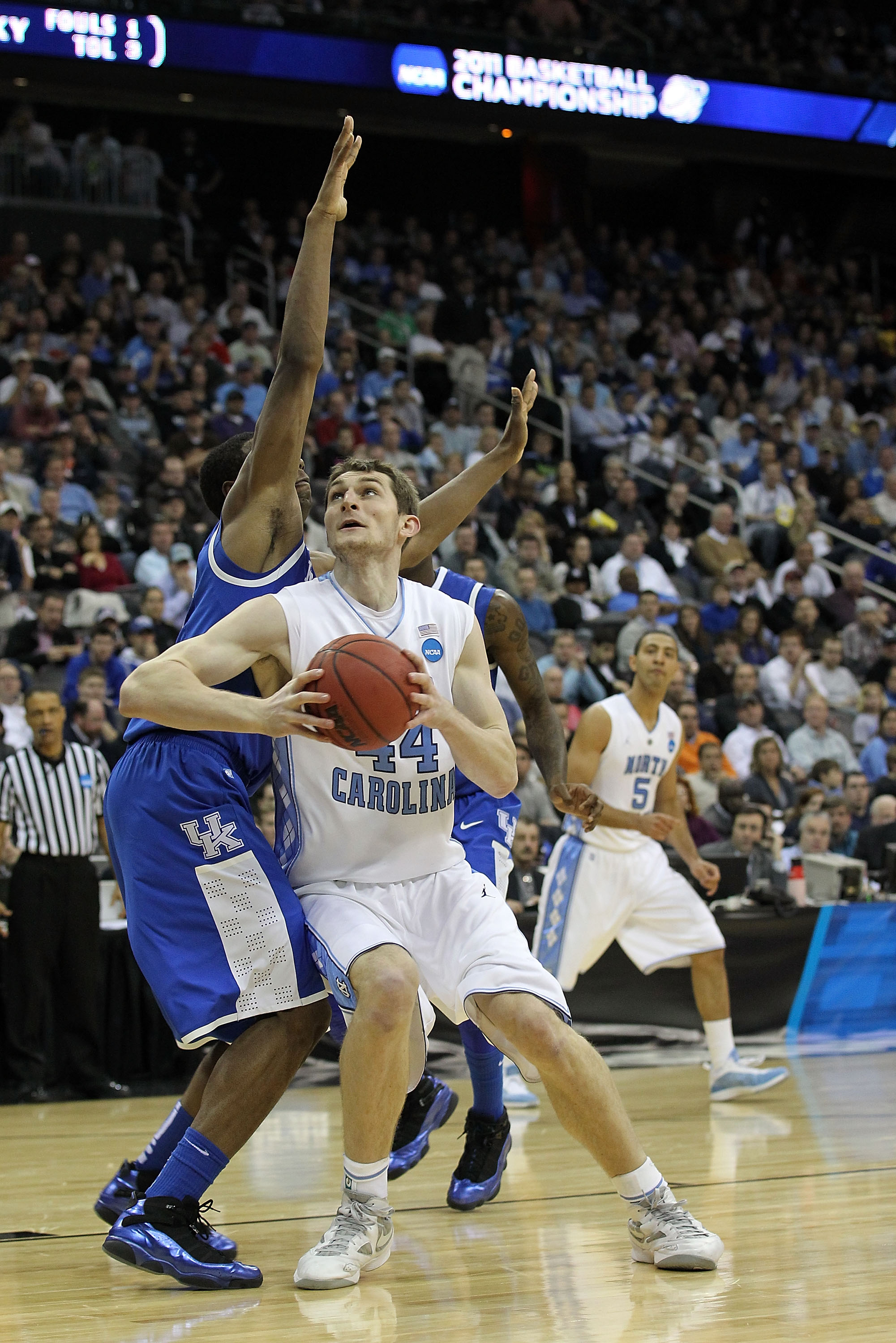 NEWARK, NJ - MARCH 27:  Tyler Zeller #44 of the North Carolina Tar Heels in action against Terrence Jones #3 of the Kentucky Wildcats during the east regional final of the 2011 NCAA men's basketball tournament at Prudential Center on March 27, 2011 in New