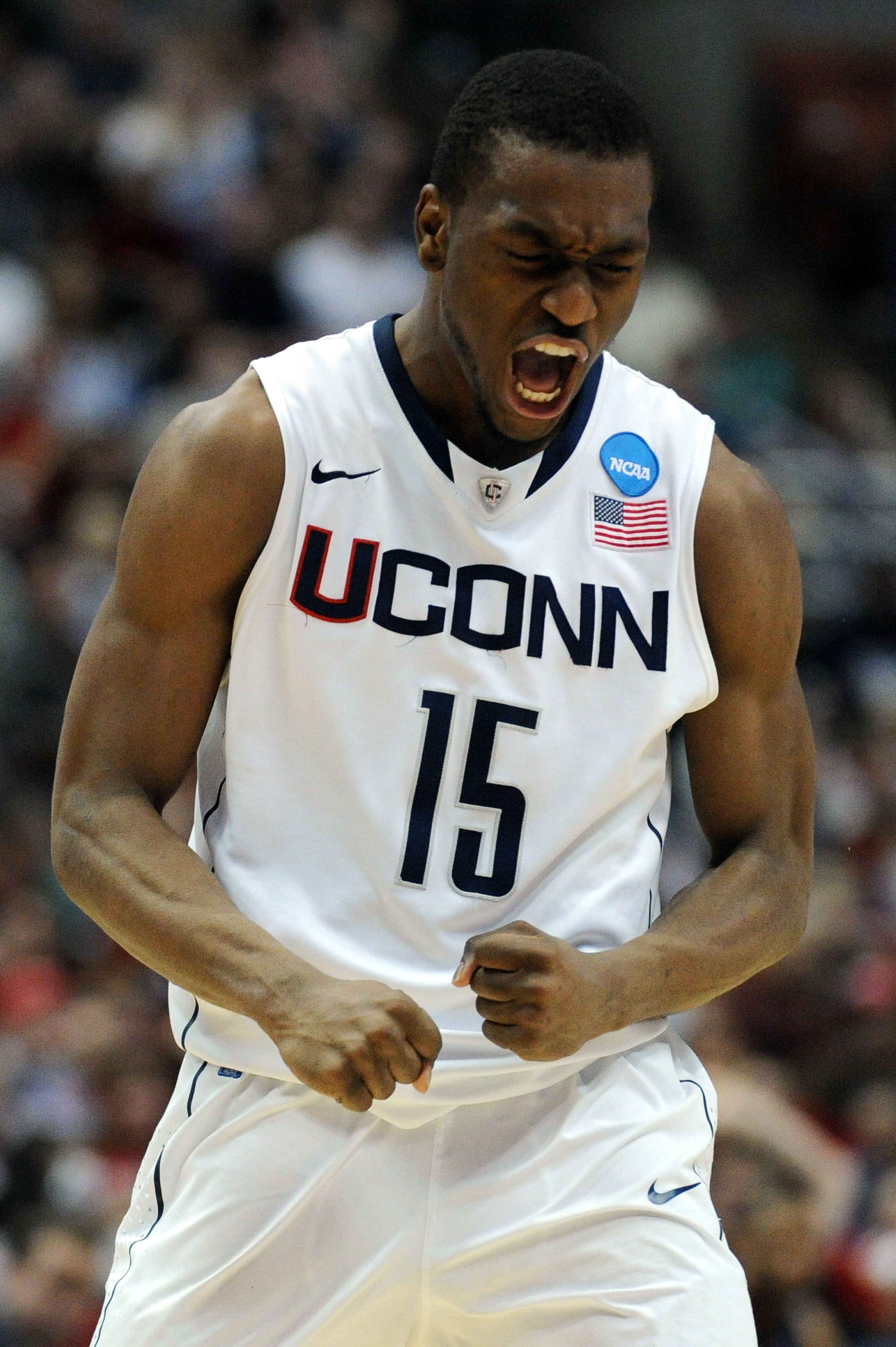 ANAHEIM, CA - MARCH 26:  Kemba Walker #15 of the Connecticut Huskies celebrates after a play towards the end of the game against the Arizona Wildcats during the west regional final of the 2011 NCAA men's basketball tournament at the Honda Center on March