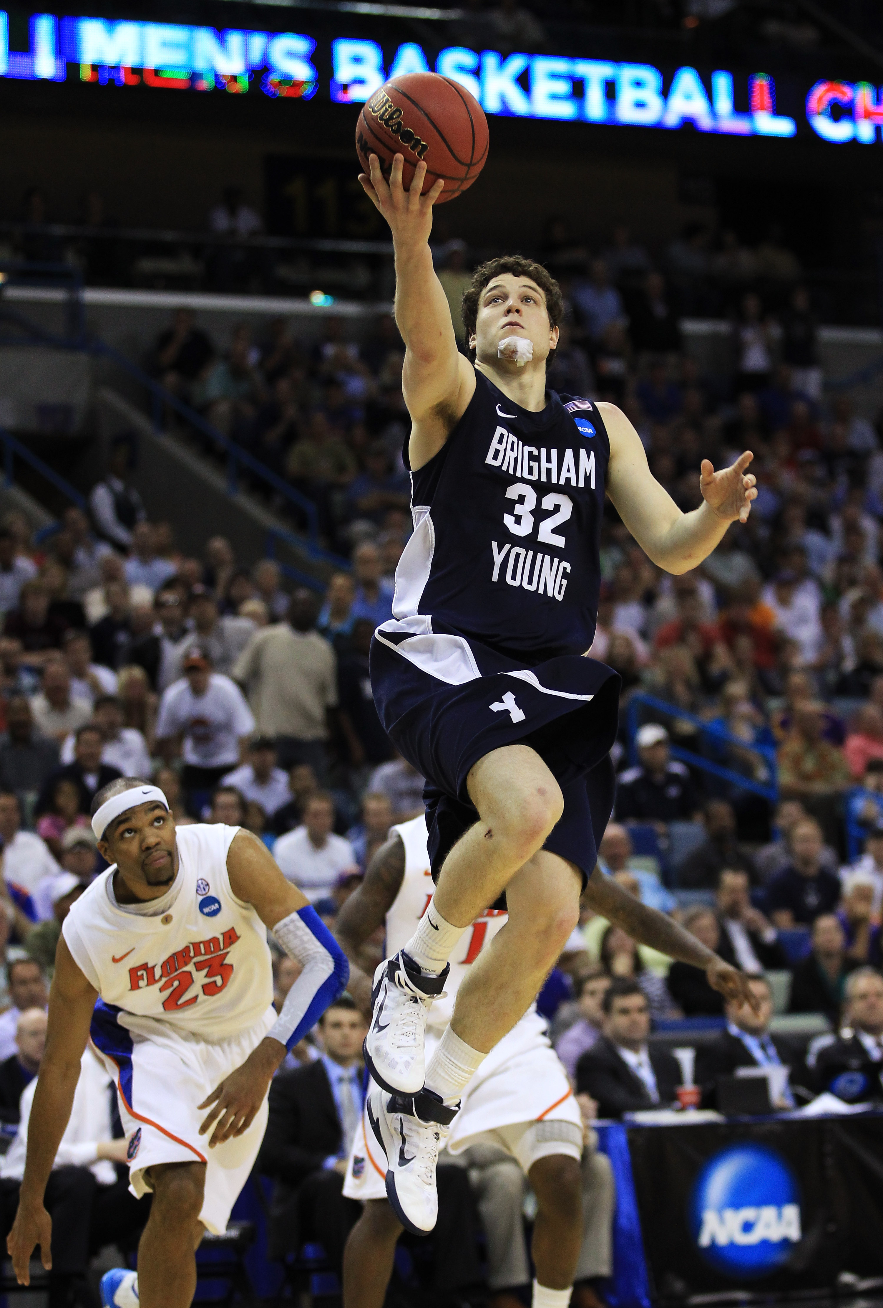 NEW ORLEANS, LA - MARCH 24:  Jimmer Fredette #32 of the Brigham Young Cougars shoots against the Florida Gators during the Southeast regional of the 2011 NCAA men's basketball tournament at New Orleans Arena on March 24, 2011 in New Orleans, Louisiana.  (