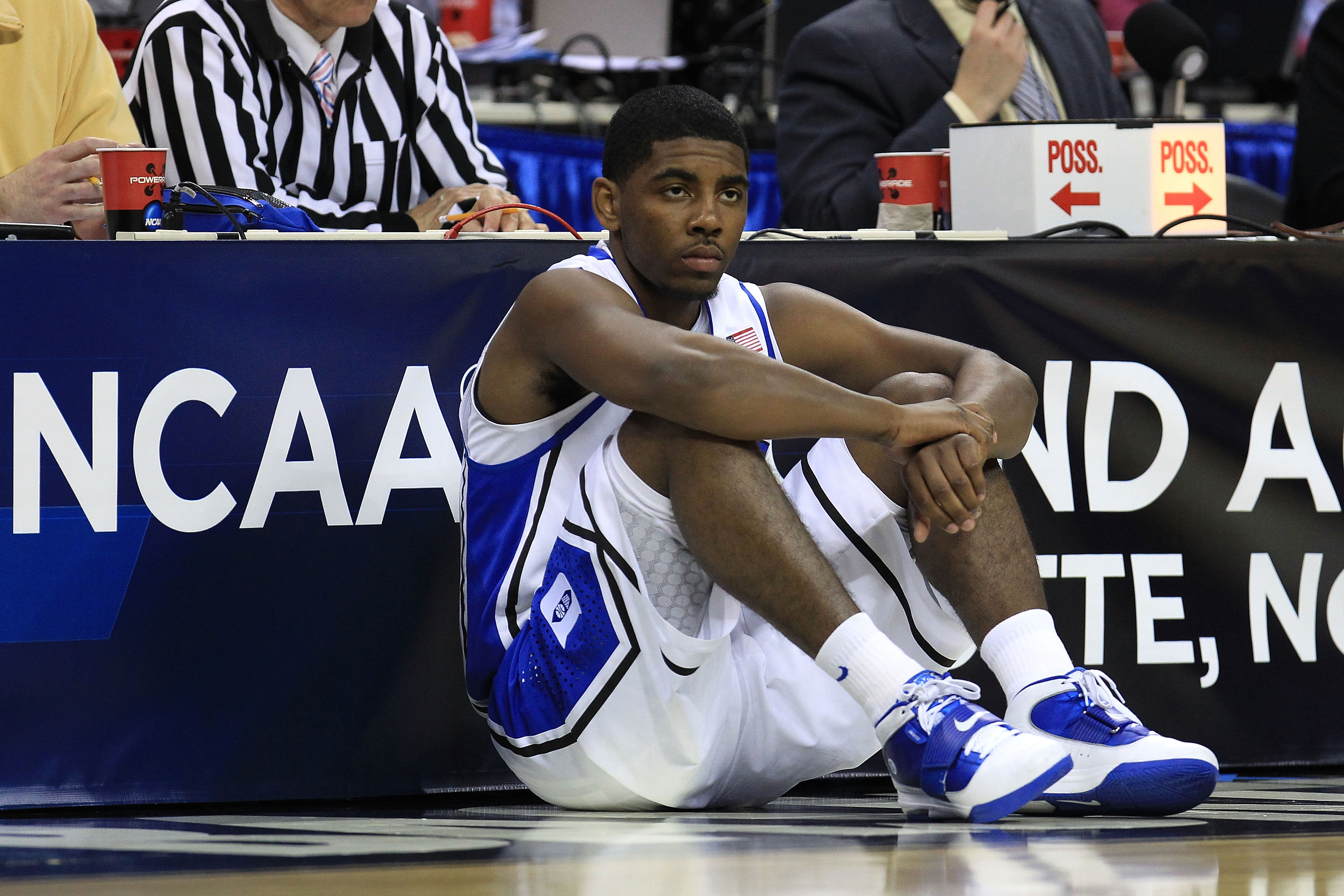 CHARLOTTE, NC - MARCH 20:  Kyrie Irving #1 of the Duke Blue Devils waits to enter the game while taking on the Michigan Wolverines during the third round of the 2011 NCAA men's basketball tournament at Time Warner Cable Arena on March 20, 2011 in Charlott