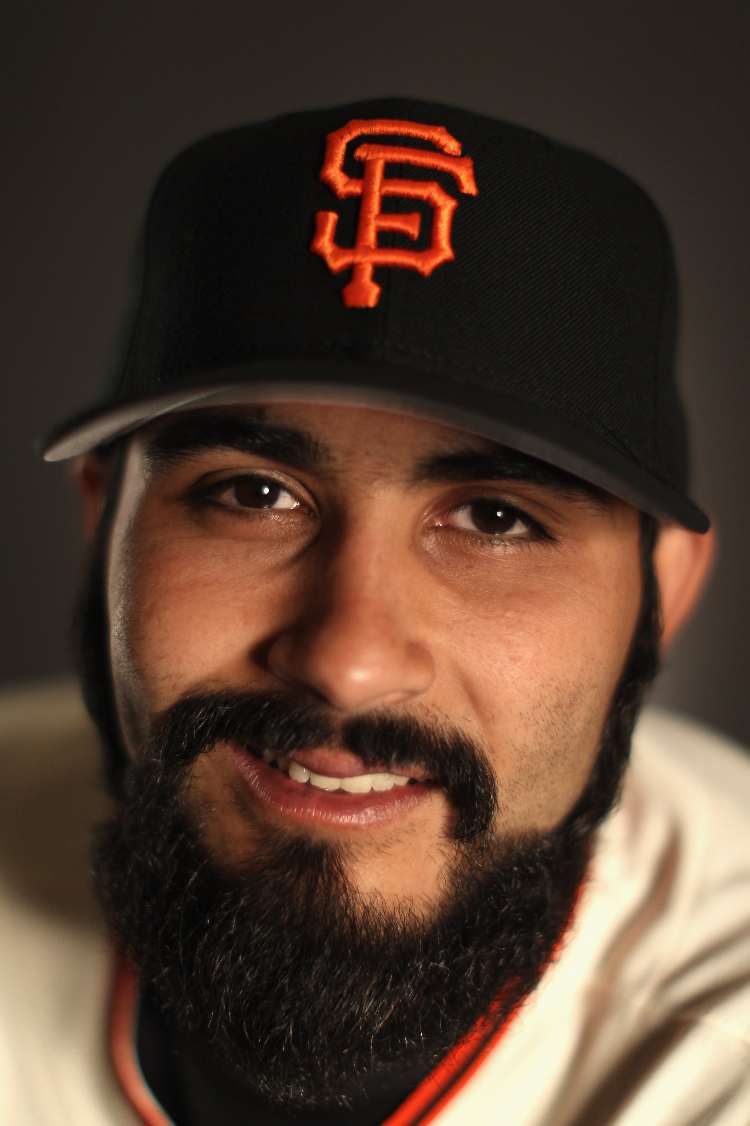 SCOTTSDALE, AZ - FEBRUARY 23:  Sergio Romo #54 of the San Francisco Giants poses for a portrait during media photo day at Scottsdale Stadium on February 23, 2011 in Scottsdale, Arizona.  (Photo by Ezra Shaw/Getty Images)