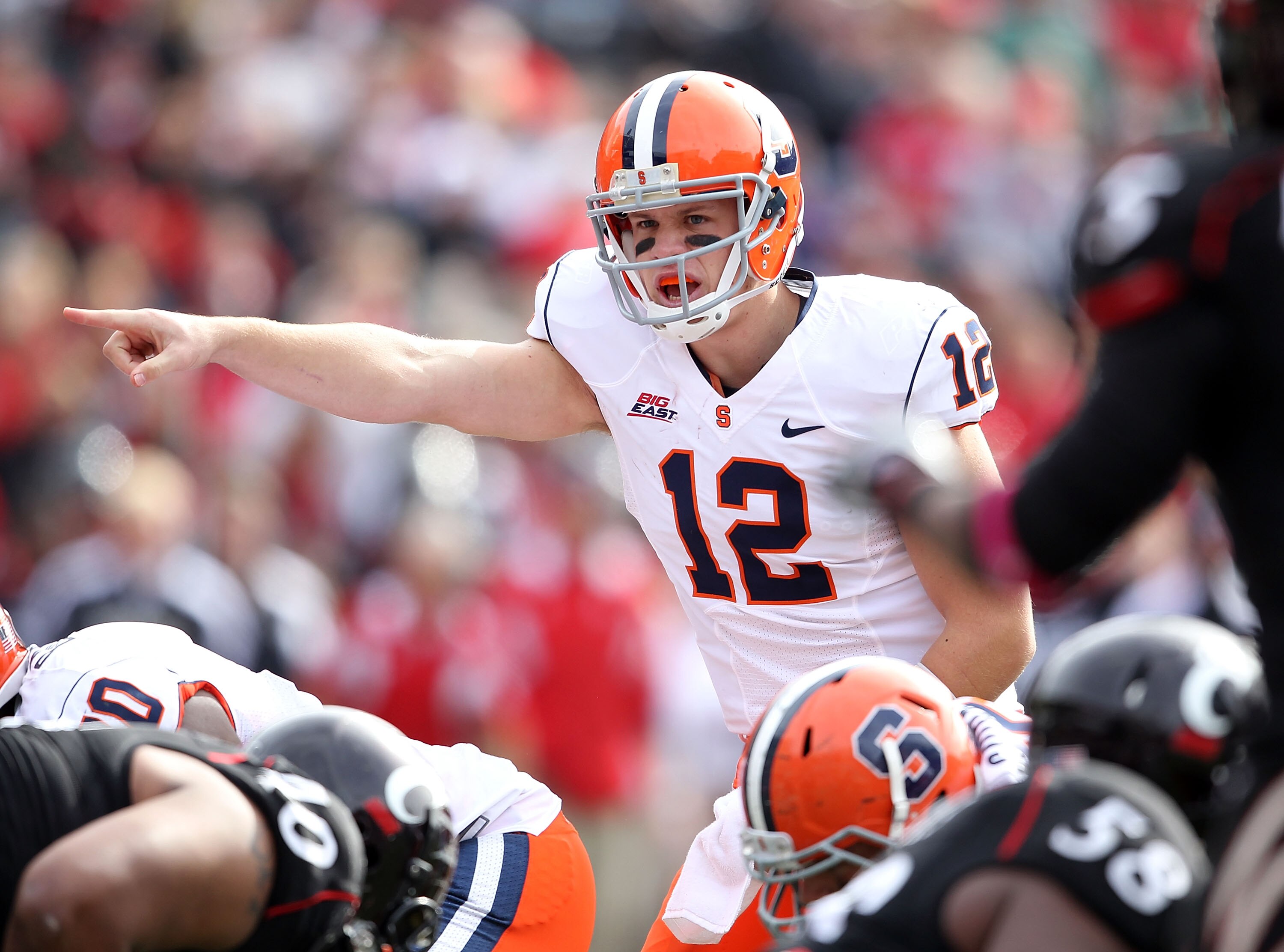 CINCINNATI - OCTOBER 30:  Ryan Nassib #12 of the Syracuse Orange gives instructions to his team during the Big East Conference game against the Cincinnati Bearcats at Nippert Stadium on October 30, 2010 in Cincinnati, Ohio.  (Photo by Andy Lyons/Getty Ima