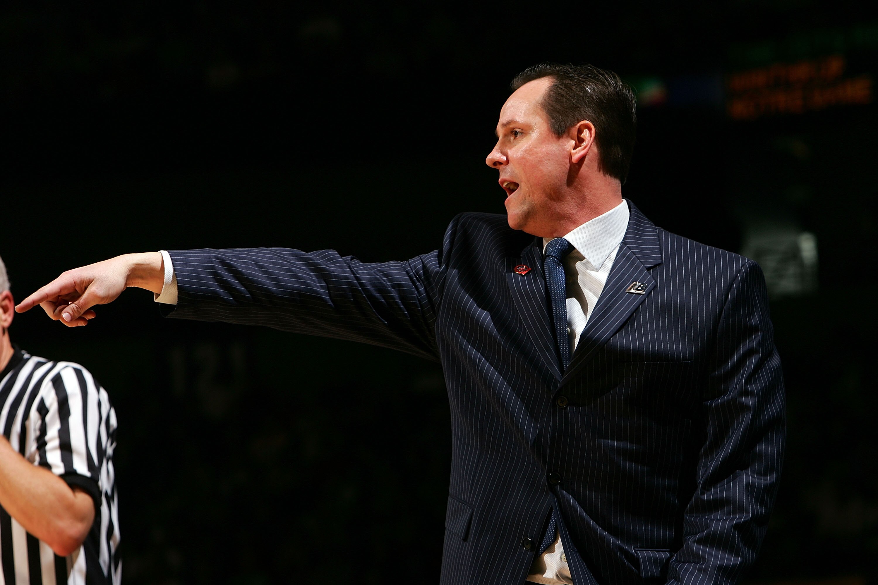 SPOKANE, WA - MARCH 16:  Head Coach Gregg Marshall of the Winthrop Eagles directs his players from the sideline during their first round game against Notre Dame Fighting Irish  during the NCAA Men's Basketball Tournament at Spokane Memorial Arena on March