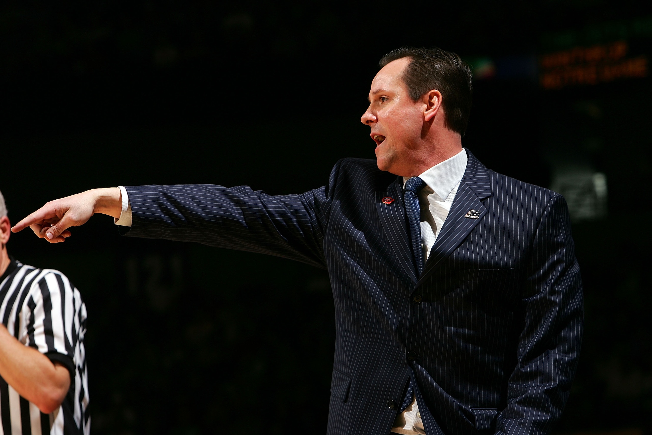 SPOKANE, WA - MARCH 16:  Head Coach Gregg Marshall of the Winthrop Eagles directs his players from the sideline during their first round game against Notre Dame Fighting Irish  during the NCAA Men's Basketball Tournament at Spokane Memorial Arena on March