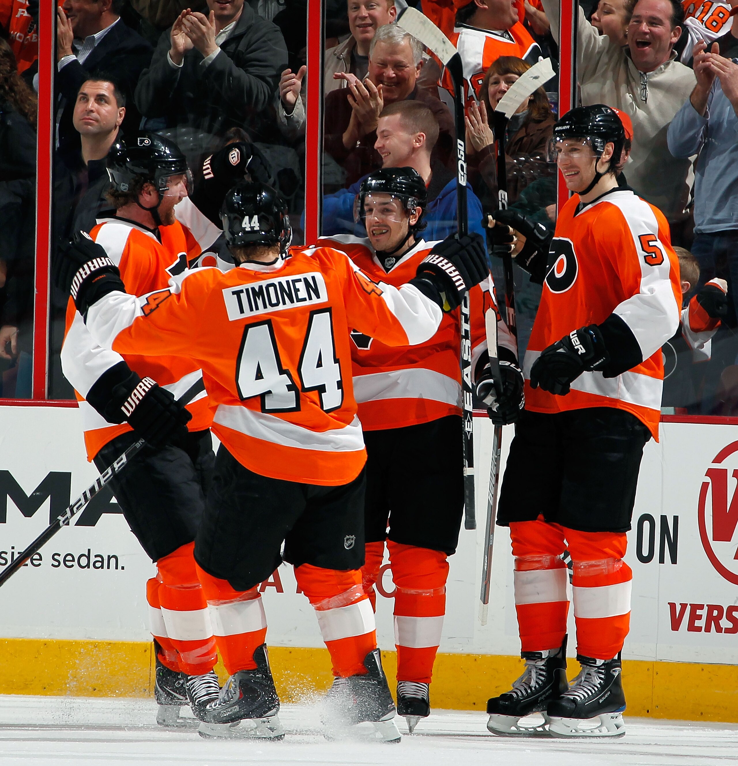 PHILADELPHIA, PA - MARCH 22:  Danny Briere (center, facing camera) of the Philadelphia Flyers celebrates a goal with teammates during an NHL hockey game against the Washington Capitals at the Wells Fargo Center on March 22, 2011 in Philadelphia, Pennsylva