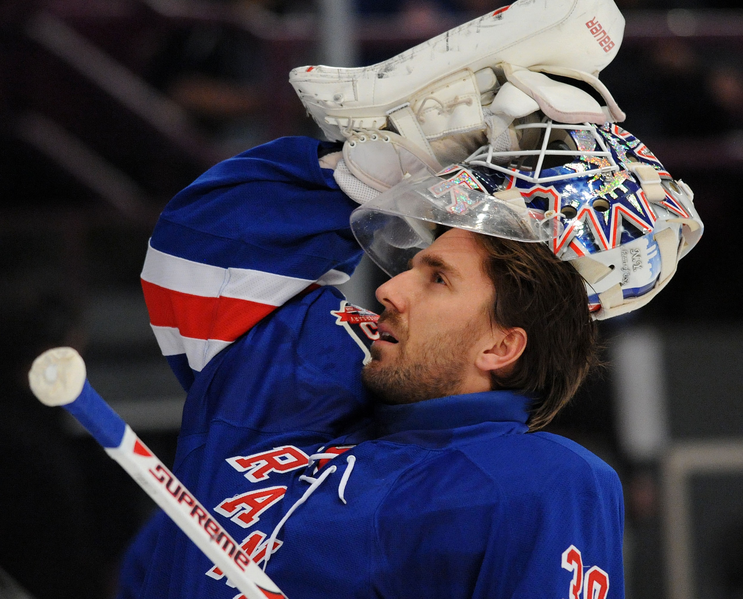 NEW YORK, NY - MARCH 24: Henrik Lundqvist #30 of the New York Rangers looks at the crowd as he puts his mask on prior to the game against the Ottawa Senators at Madison Square Garden on March 24, 2011 in New York City. (Photo by Christopher Pasatieri/Gett