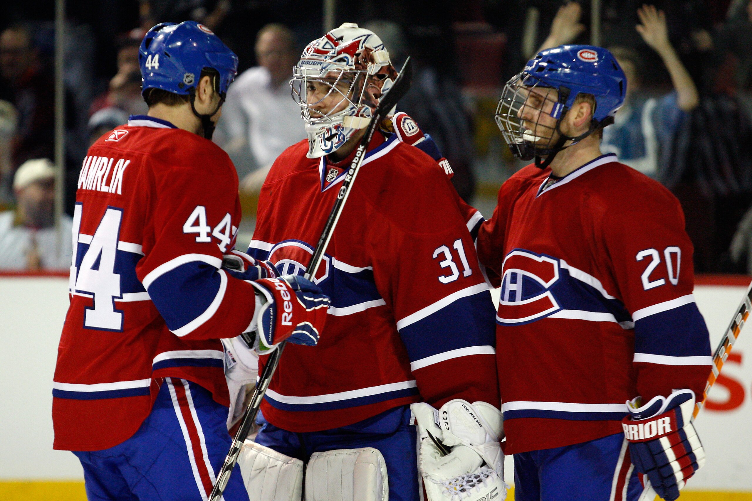 MONTREAL, CANADA - MARCH 29:  Members of the Montreal Canadiens celebrate their 3-1 victory over the Atlanta Thrashers during the NHL game at the Bell Centre on March 29, 2011 in Montreal, Quebec, Canada.  (Photo by Richard Wolowicz/Getty Images)