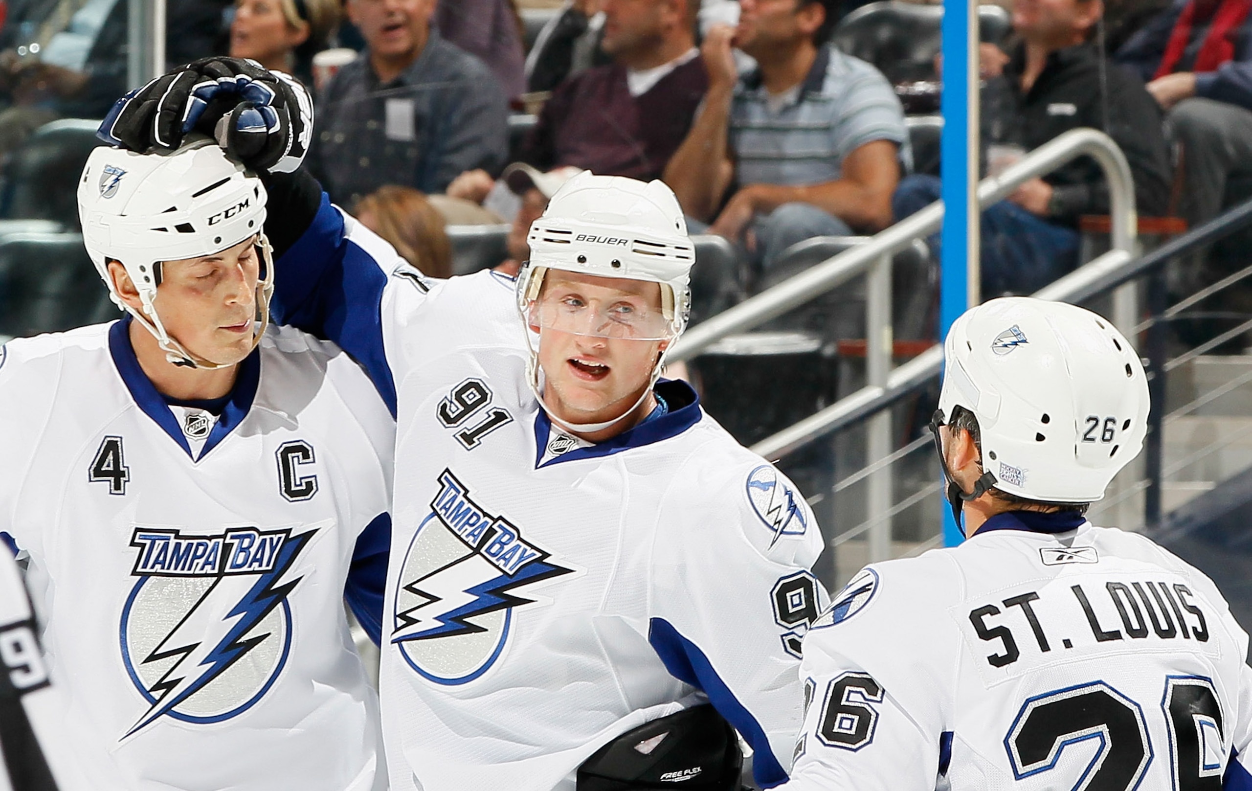 ATLANTA - OCTOBER 22:  Steven Stamkos #91 of the Tampa Bay Lightning celebrates with Vincent Lecavalier #4 and Martin St. Louis #26 after Stamkos' goal against Atlanta Thrasher at Philips Arena on October 22, 2010 in Atlanta, Georgia.  (Photo by Kevin C.