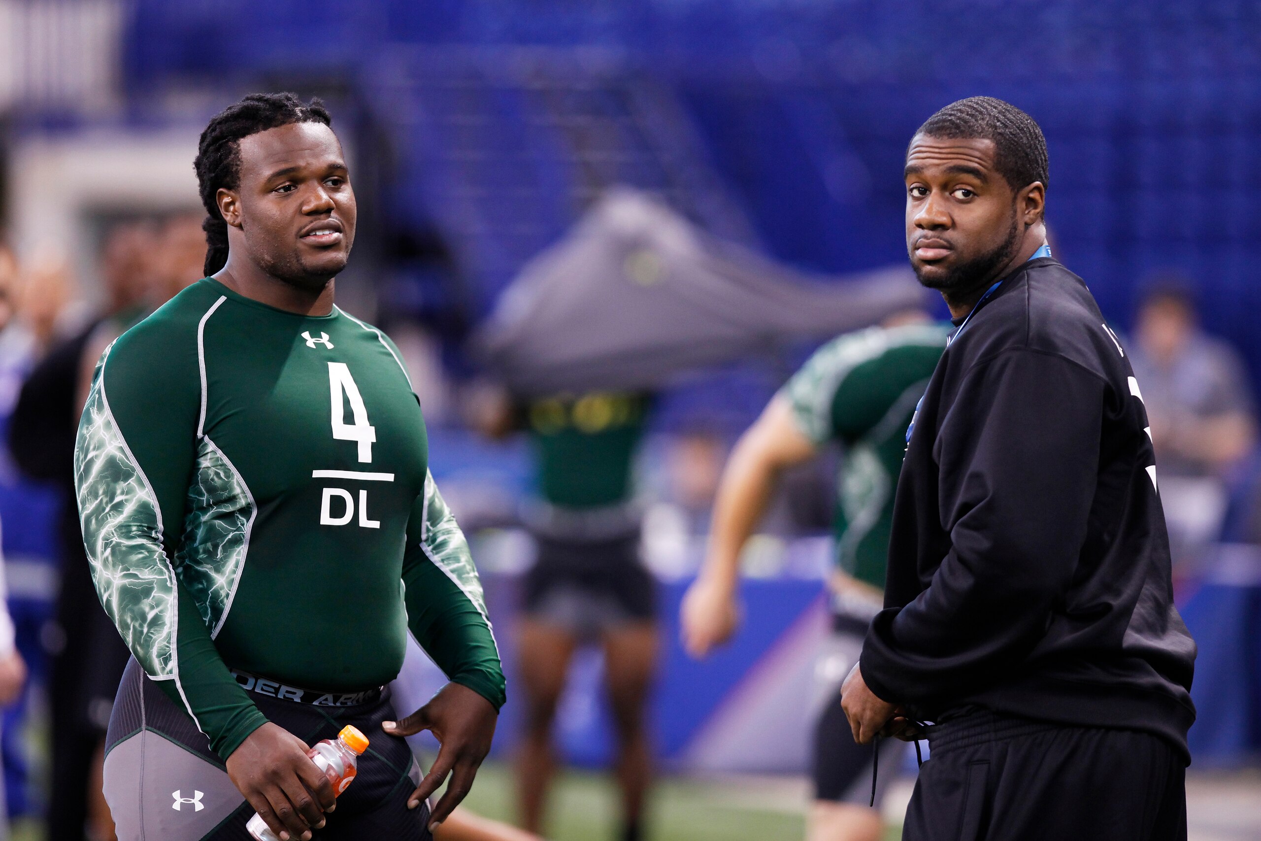 INDIANAPOLIS, IN - FEBRUARY 28: Former North Carolina teammates Marvin Austin (L) and Bruce Carter look on during the 2011 NFL Scouting Combine at Lucas Oil Stadium on February 28, 2011 in Indianapolis, Indiana. (Photo by Joe Robbins/Getty Images) INDIANAPOLIS, IN - FEBRUARY 28: Former North Carolina teammates Marvin Austin (L) and Bruce Carter look on during the 2011 NFL Scouting Combine at Lucas Oil Stadium on February 28, 2011 in Indianapolis, Indiana. (Photo by Joe Robbins/Getty Images)