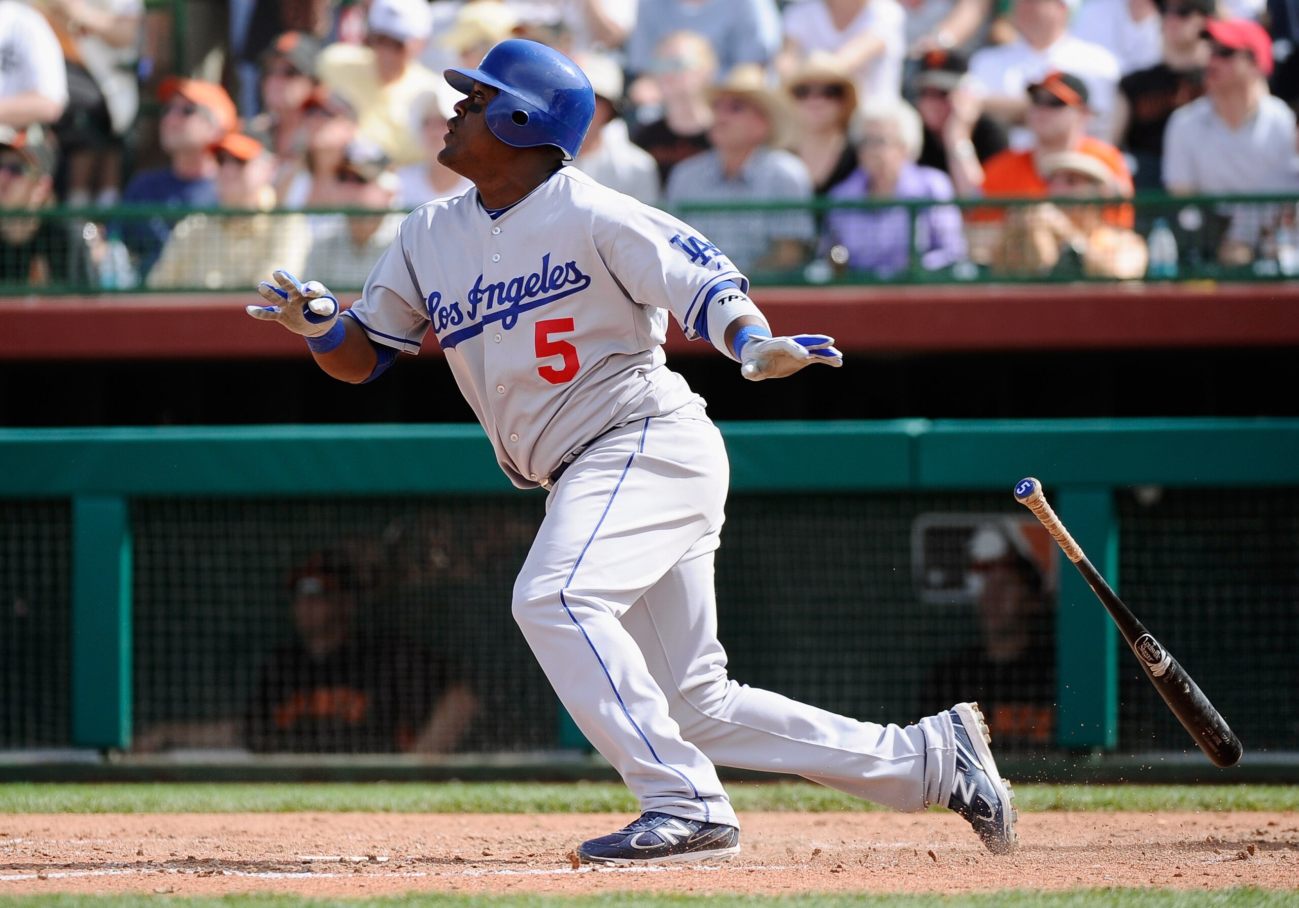 SCOTTSDALE, AZ - MARCH 18:  Juan Uribe #5 of the Los Angeles Dodgers hits fly ball against the San Francisco Giants during the sixth inning of the baseball game at Scottsdale Stadium on March 18, 2011 in Scottsdale, Arizona.  (Photo by Kevork Djansezian/G