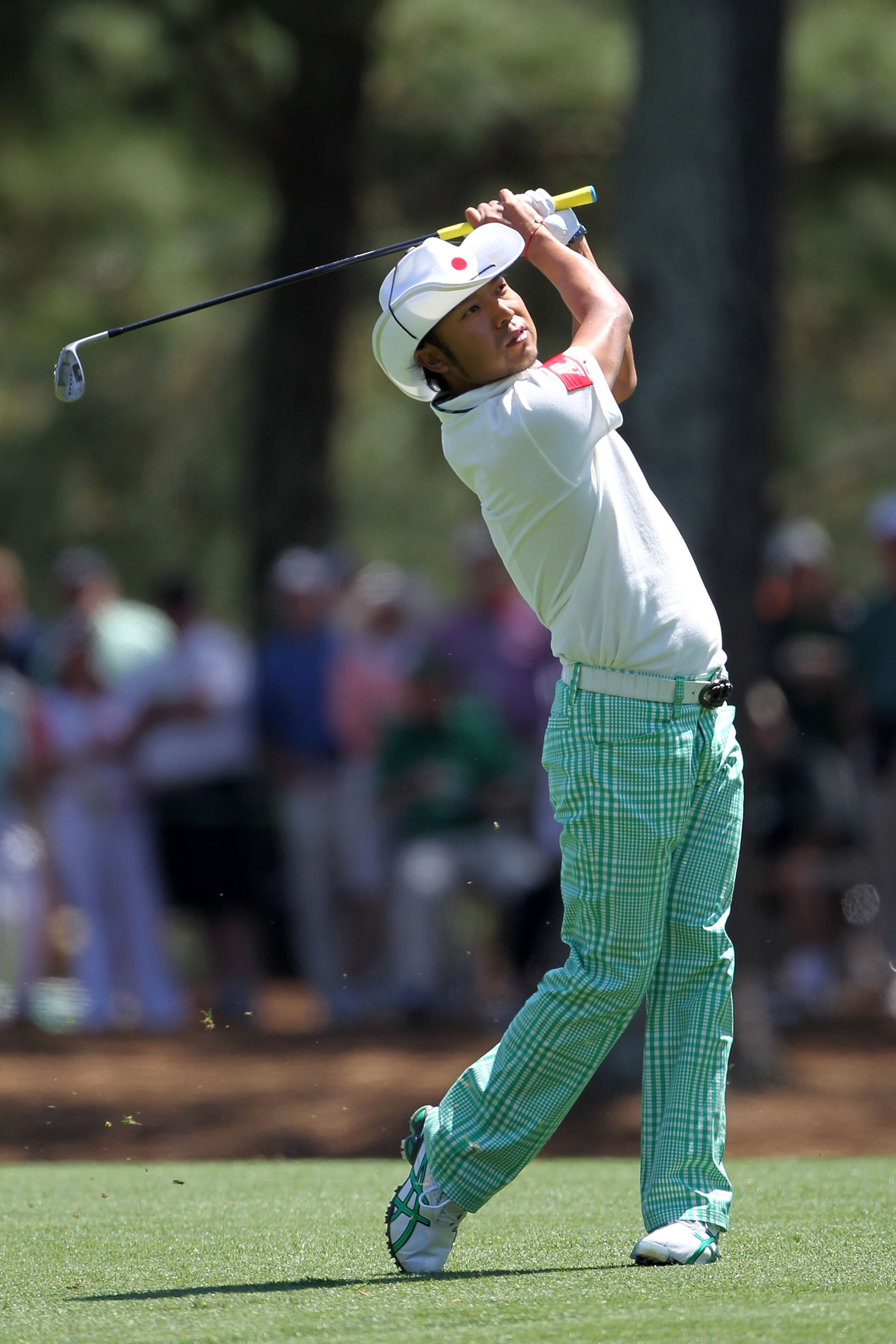 AUGUSTA, GA - APRIL 09:  Shingo Katayama of Japan plays a shot on the 14th hole during the second round of the 2010 Masters Tournament at Augusta National Golf Club on April 9, 2010 in Augusta, Georgia.  (Photo by Jamie Squire/Getty Images)