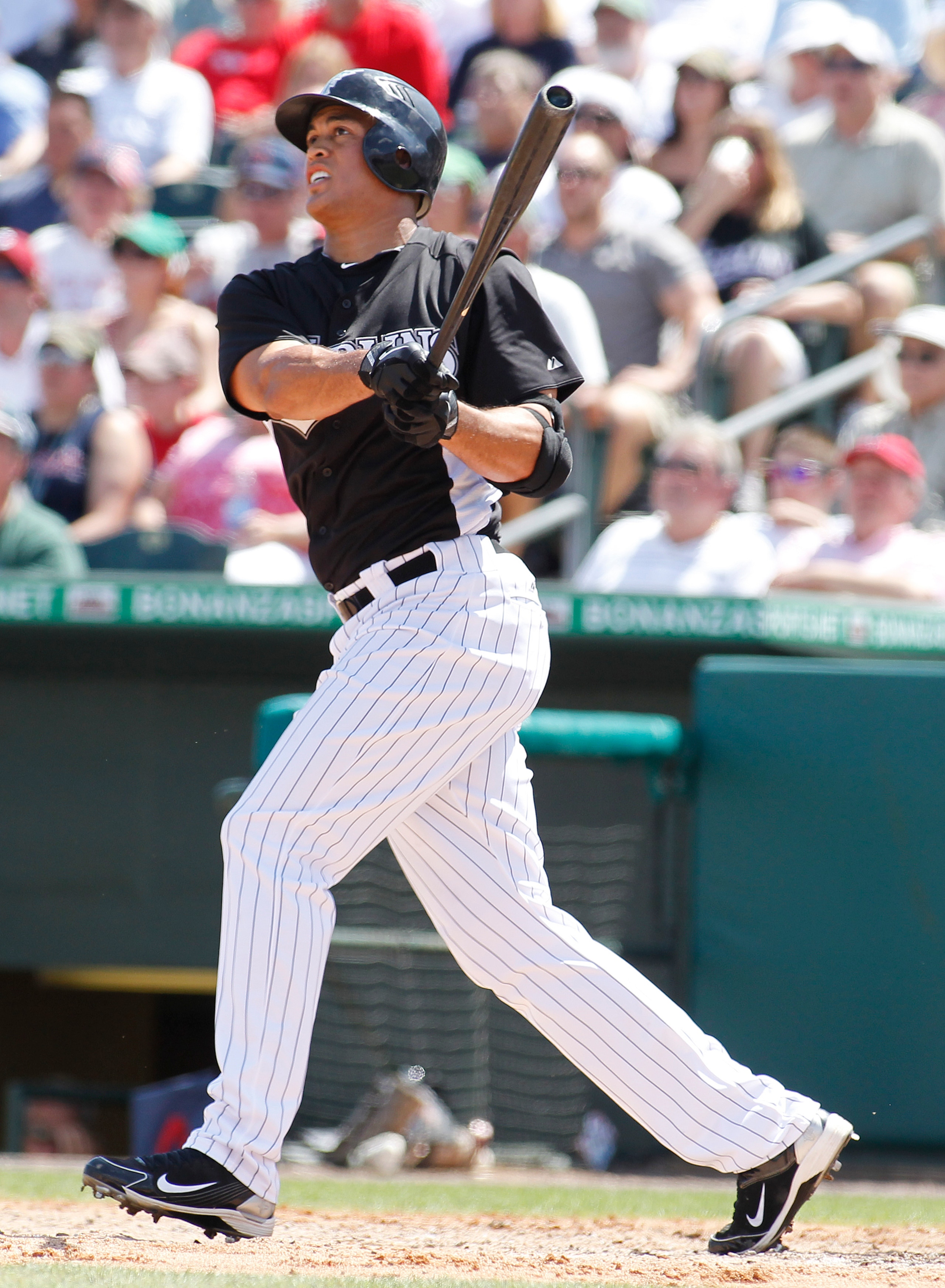 JUPITER, FL - MARCH 24: Mike Stanton #27 of the Florida Marlins watches as the ball he hit clears the left field fence for a three run home run against the Boston Red Sox in the fourth inning at Roger Dean Stadium on March 24, 2011 in Jupiter, Florida. (P