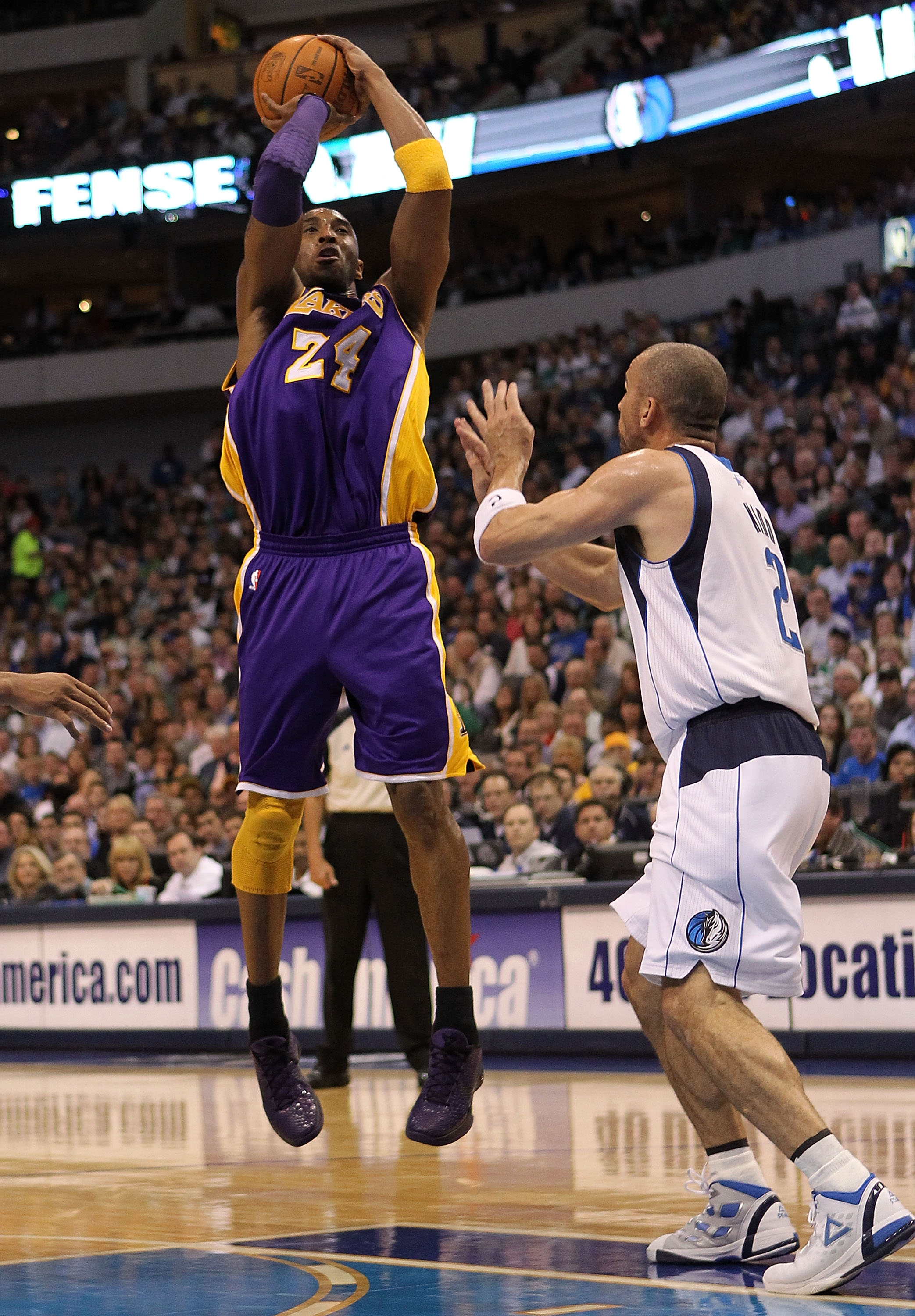 Kobe taking shots on, off court
