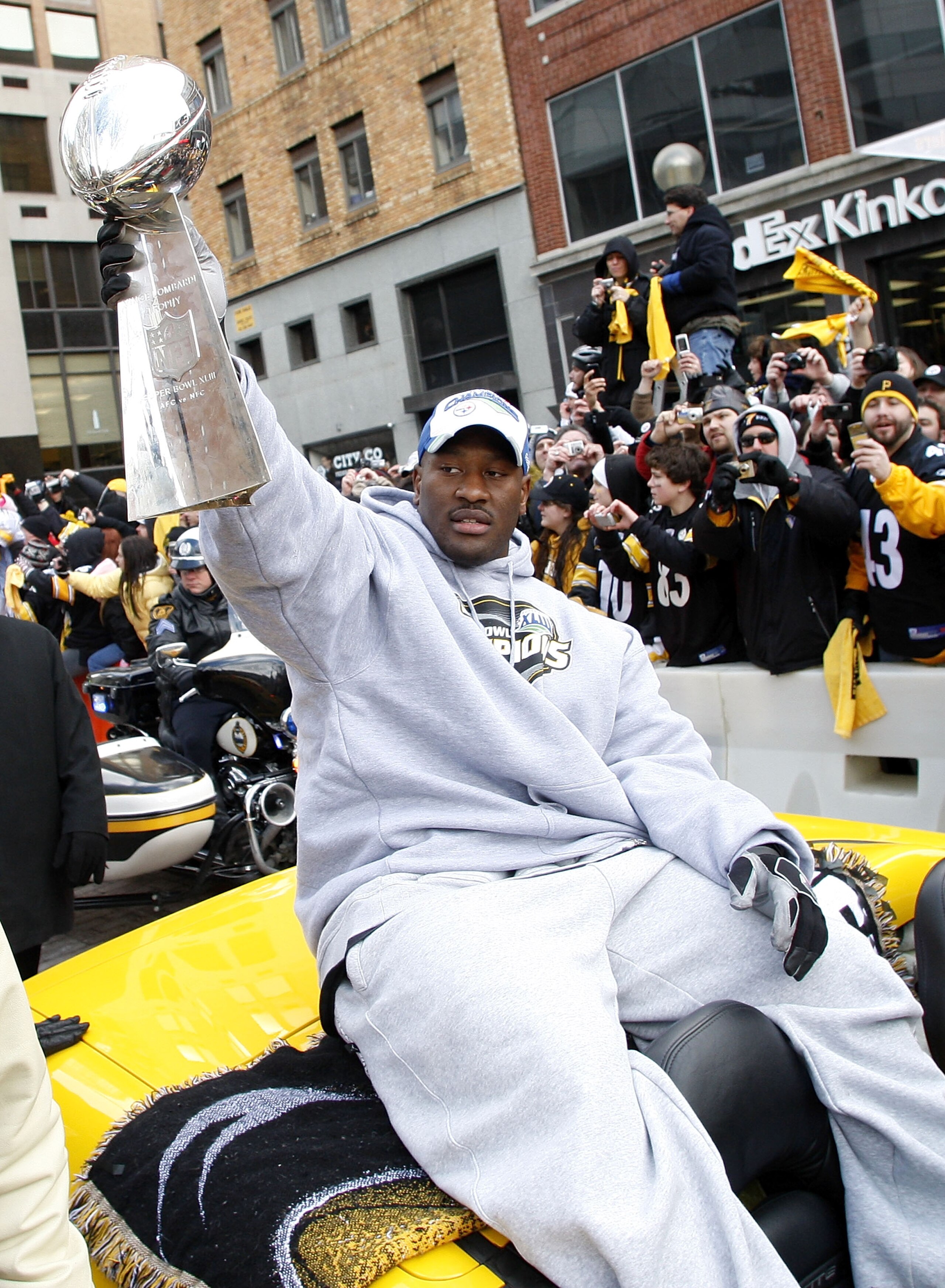 PITTSBURGH - FEBRUARY 03: James Harrison #92 of the Pittsburgh Steelers shows off the Super Bowl XLIII trophy during a parade on February 3, 2009 in Pittsburgh, Pennsylvania. (Photo by Gregory Shamus/Getty Images) PITTSBURGH - FEBRUARY 03: James Harrison #92 of the Pittsburgh Steelers shows off the Super Bowl XLIII trophy during a parade on February 3, 2009 in Pittsburgh, Pennsylvania. (Photo by Gregory Shamus/Getty Images)