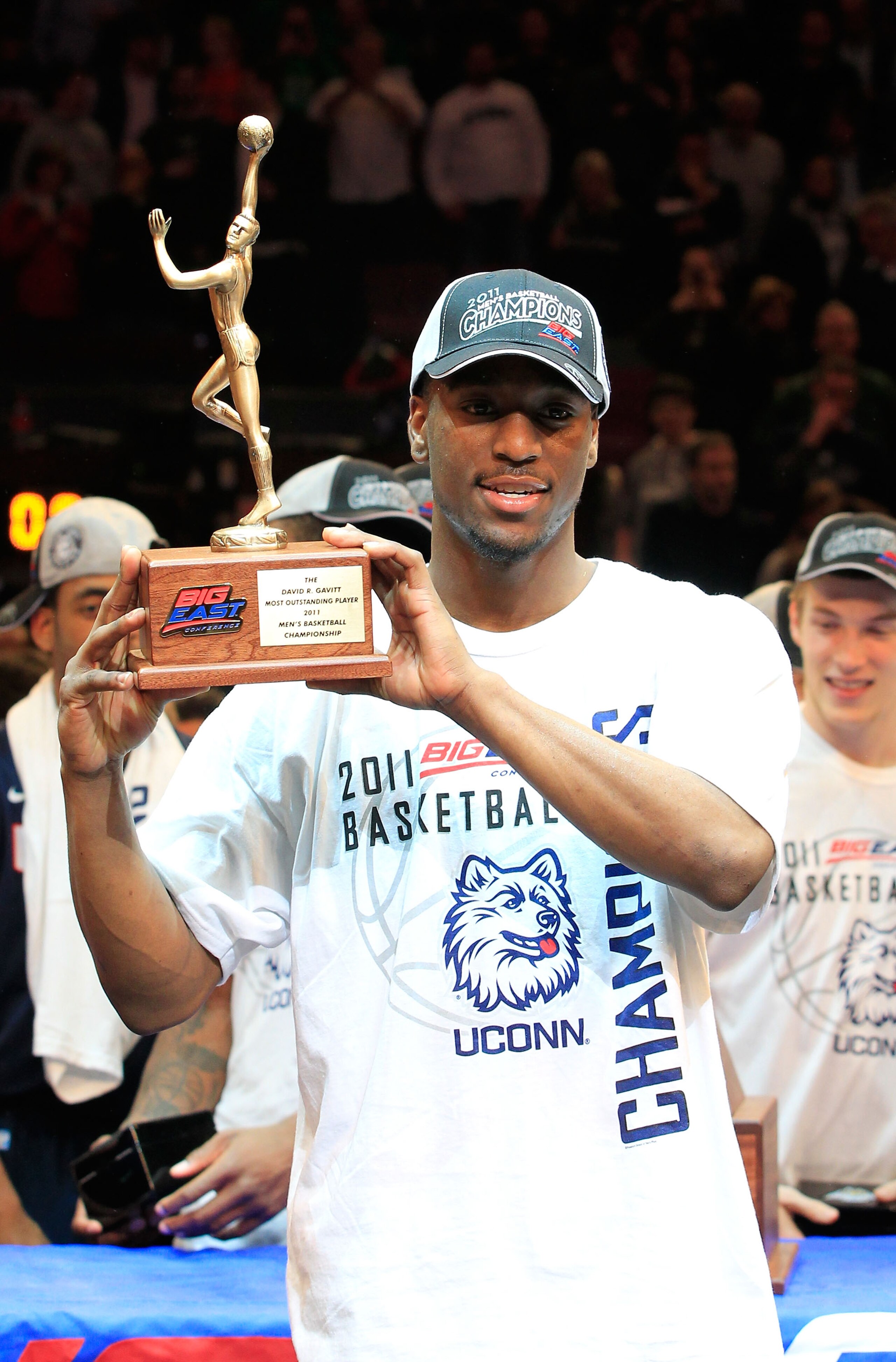NEW YORK, NY - MARCH 12: Kemba Walker #15 of the Connecticut Huskies holds up the David R. Gavitt Most Outstanding Player trophy after defeating the Louisville Cardinals during the championship of the 2011 Big East Men's Basketball Tournament presented b NEW YORK, NY - MARCH 12: Kemba Walker #15 of the Connecticut Huskies holds up the David R. Gavitt Most Outstanding Player trophy after defeating the Louisville Cardinals during the championship of the 2011 Big East Men's Basketball Tournament presented b