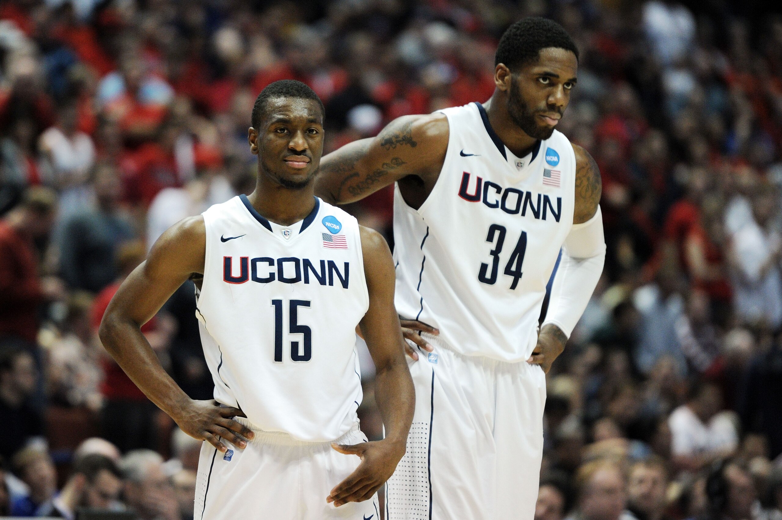 ANAHEIM, CA - MARCH 26: Kemba Walker #15 and Alex Oriakhi #34 of the Connecticut Huskies look on against the Arizona Wildcats during the west regional final of the 2011 NCAA men's basketball tournament at the Honda Center on March 26, 2011 in Anaheim, Ca ANAHEIM, CA - MARCH 26: Kemba Walker #15 and Alex Oriakhi #34 of the Connecticut Huskies look on against the Arizona Wildcats during the west regional final of the 2011 NCAA men's basketball tournament at the Honda Center on March 26, 2011 in Anaheim, Ca