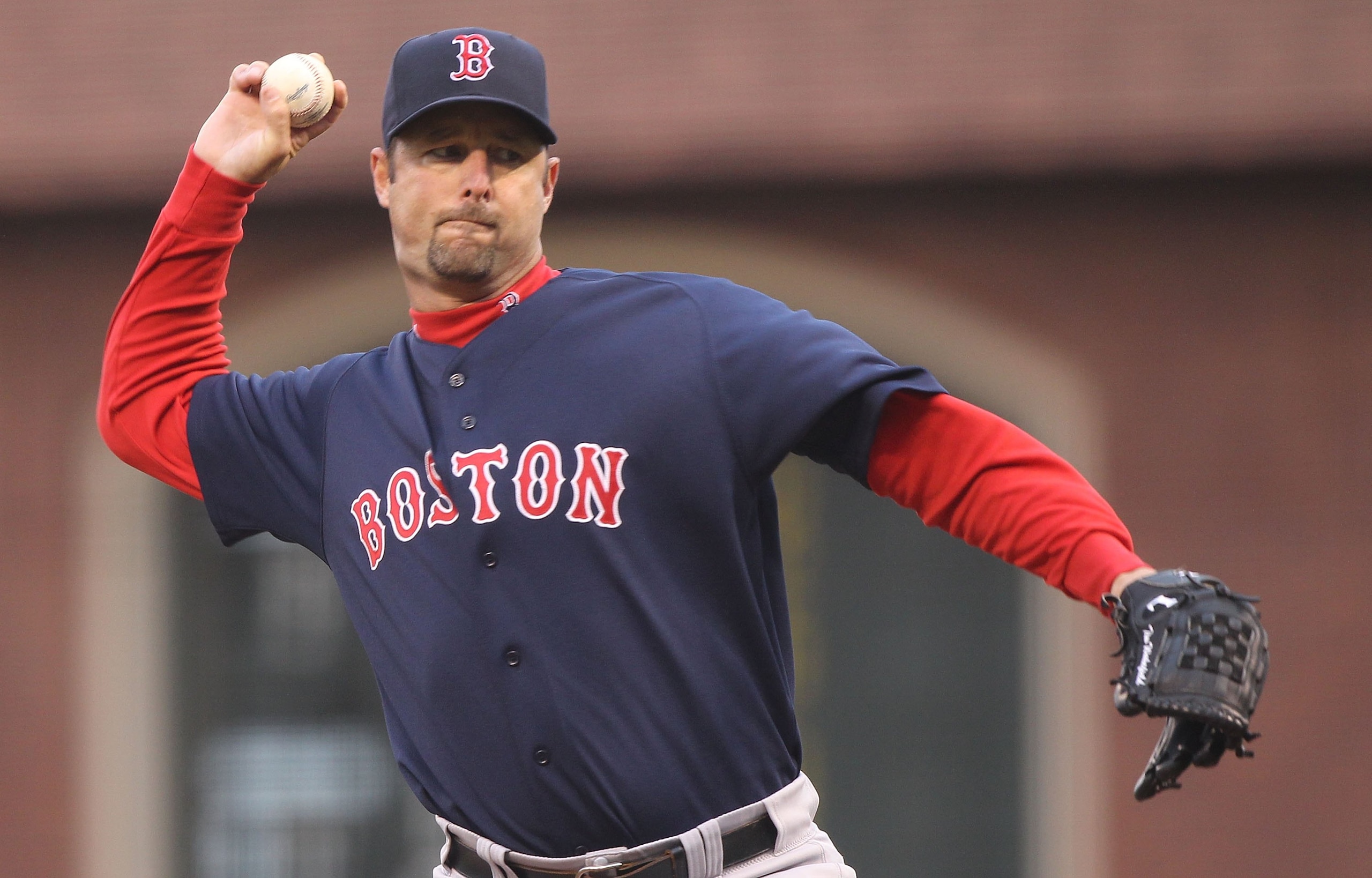 SAN FRANCISCO - JUNE 25:  Tim Wakefield #49 of the Boston Red Sox pitches against the San Francisco Giants during an MLB game at AT&T Park on June 25, 2010 in San Francisco, California.  (Photo by Jed Jacobsohn/Getty Images)
