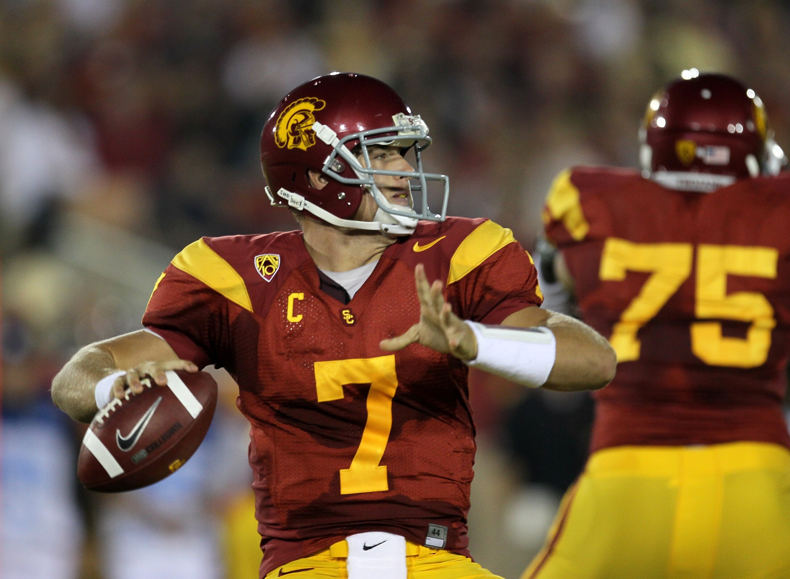 LOS ANGELES, CA - SEPTEMBER 11:  Quarterback Matt Barkley #7 of the USC Trojans throws a pass against the Virginia Cavaliers at Los Angeles Memorial Coliseum on September 11, 2010 in Los Angeles, California. USC won 17-14.  (Photo by Stephen Dunn/Getty Im