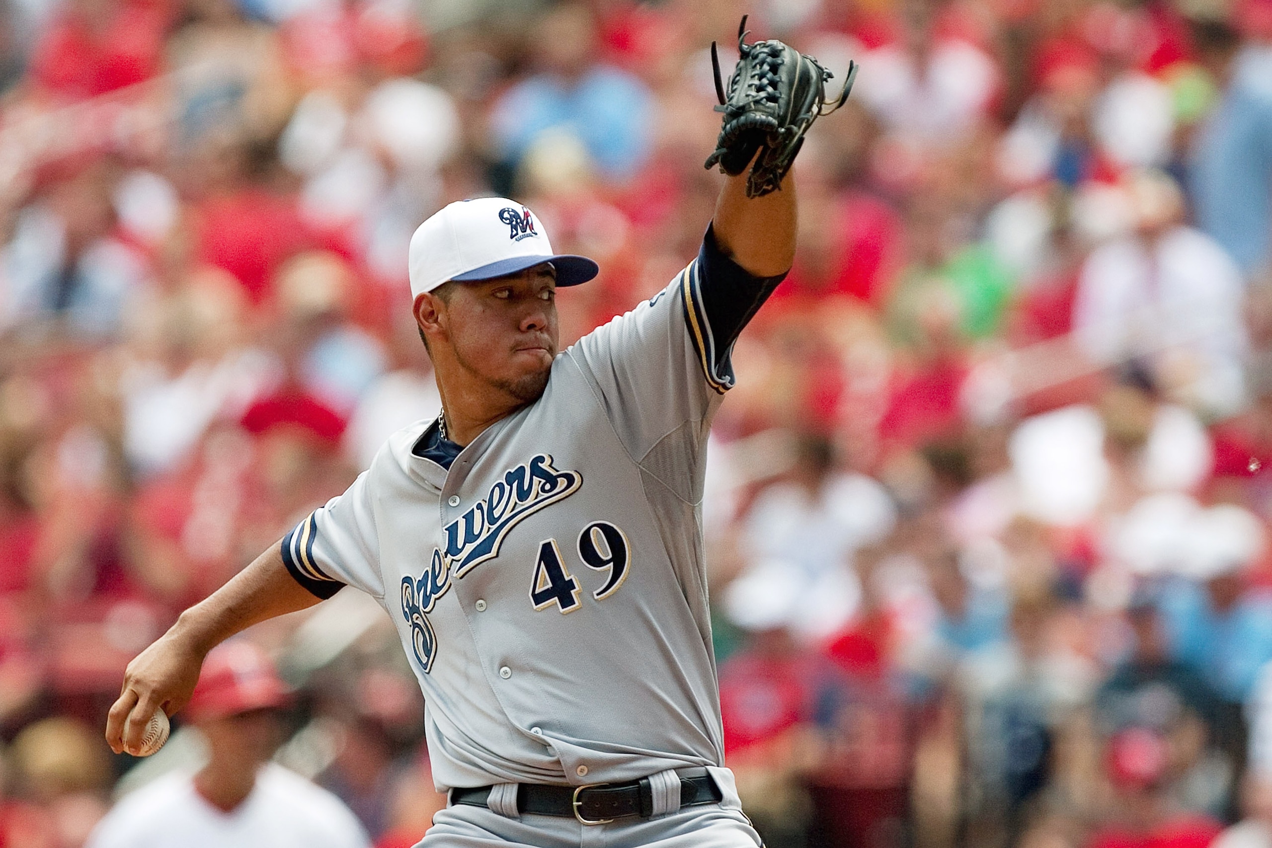 ST. LOUIS - JULY 4: Starting pitcher Yovani Gallardo #49 of the Milwaukee Brewers throws against the St. Louis Cardinals at Busch Stadium on July 4, 2010 in St. Louis, Missouri.  The Cardinals beat the Brewers 7-1.  (Photo by Dilip Vishwanat/Getty Images)