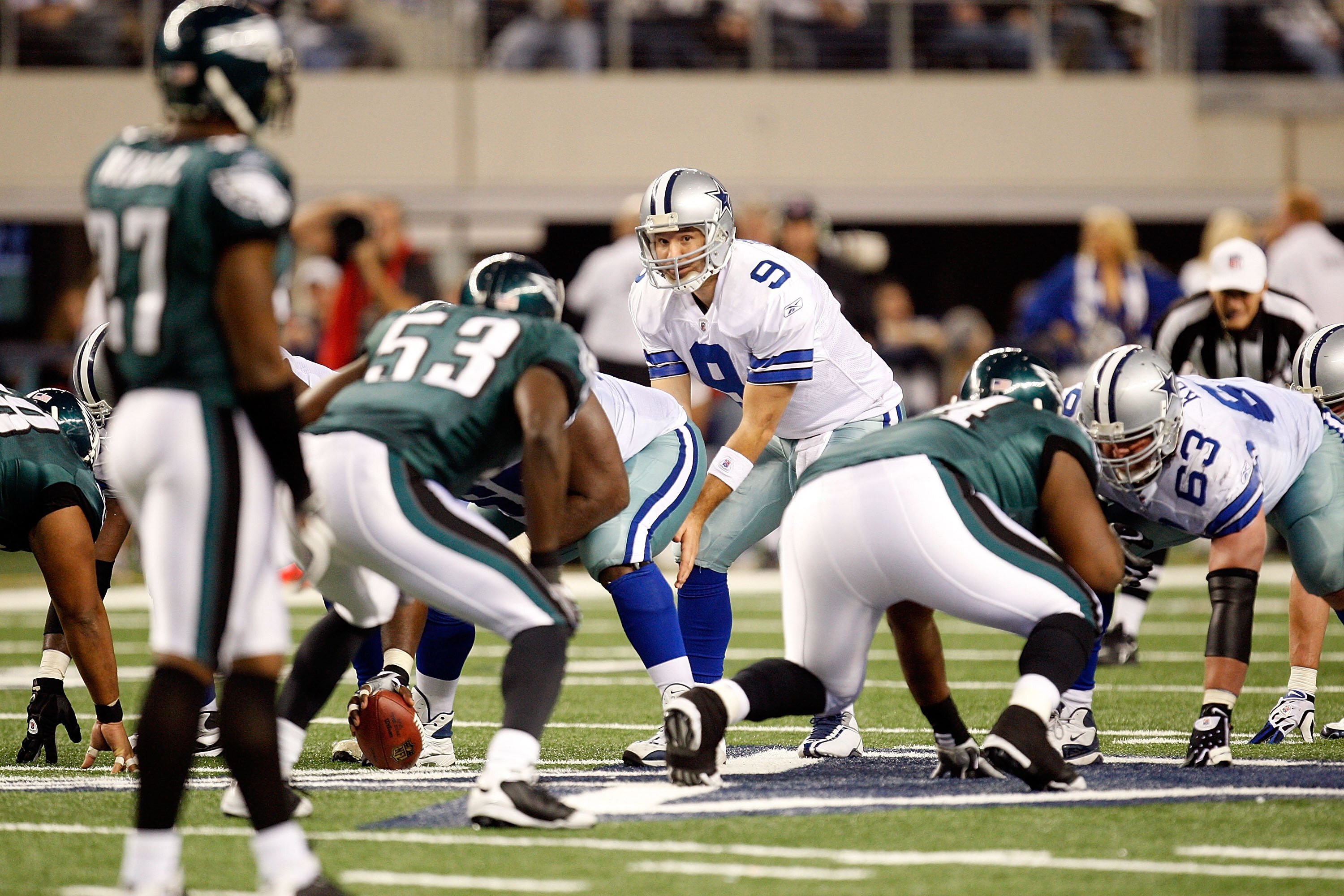 ARLINGTON, TX - JANUARY 09:  Quarterback Tony Romo #9 of the Dallas Cowboys during the 2010 NFC wild-card playoff game at Cowboys Stadium on January 9, 2010 in Arlington, Texas.  (Photo by Ronald Martinez/Getty Images)
