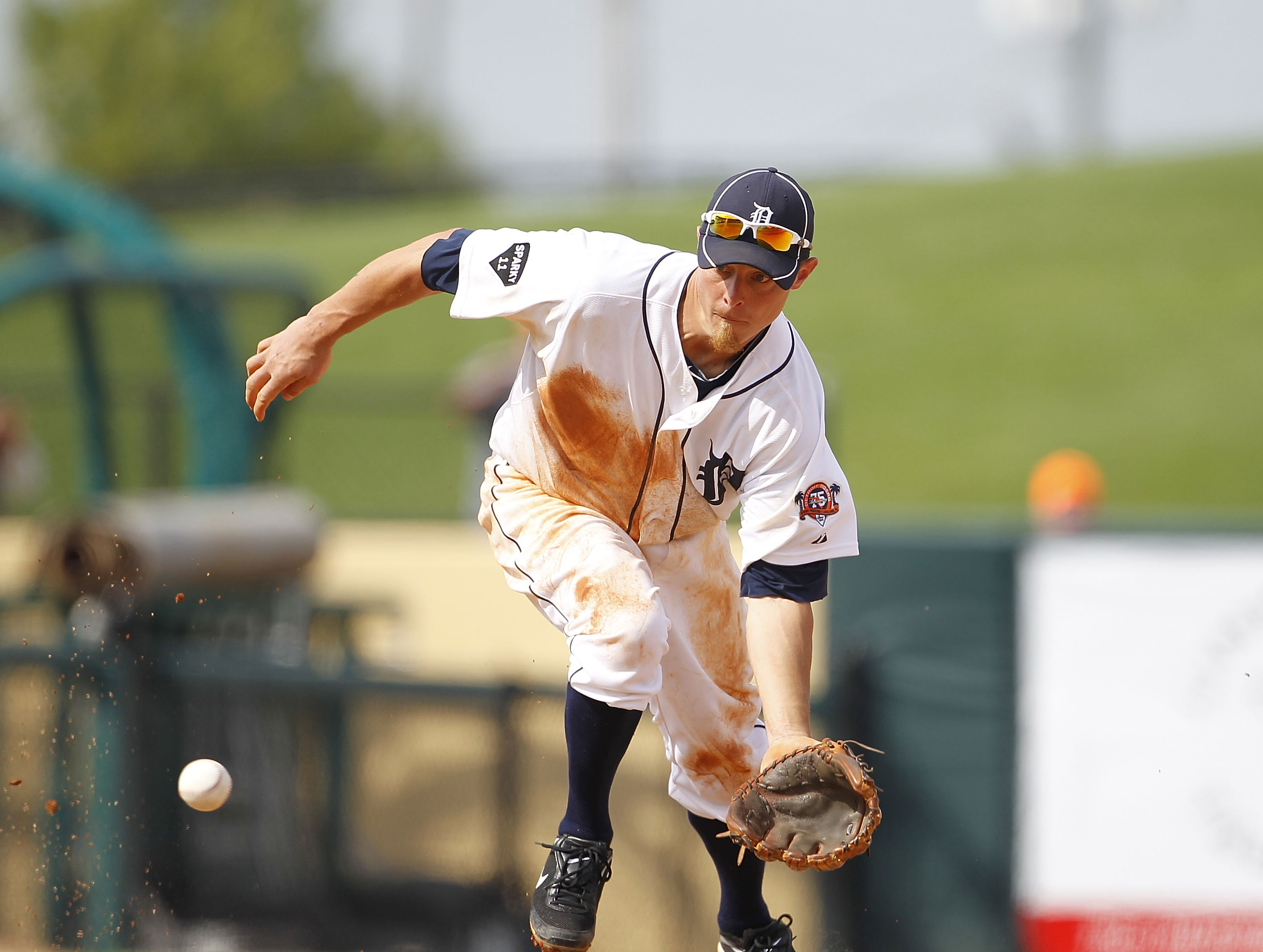 LAKELAND, FL - MARCH 01: Brandon Inge #15 of the Detroit Tigers fields a ground ball during the third inning of the game against the Toronto Blue Jays at Joker Marchant Stadium on March 1, 2011 in Lakeland, Florida. The Tigers defeated the Blue Jays 6-2.