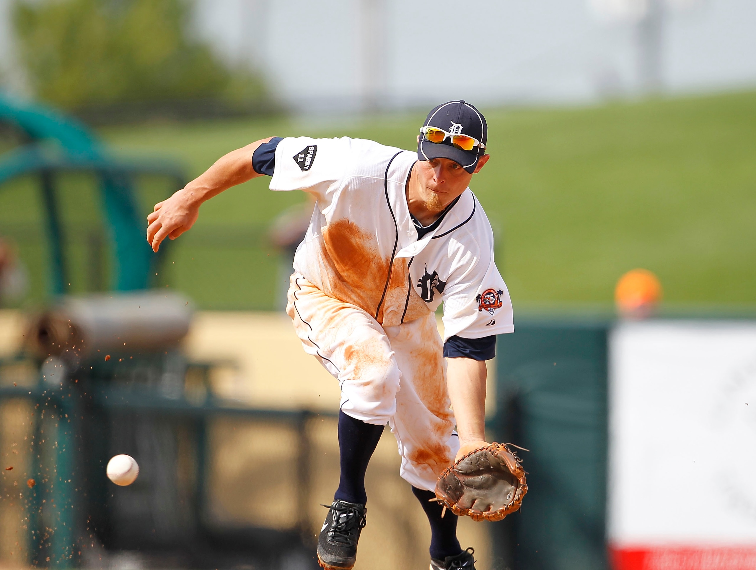 LAKELAND, FL - MARCH 01: Brandon Inge #15 of the Detroit Tigers fields a ground ball during the third inning of the game against the Toronto Blue Jays at Joker Marchant Stadium on March 1, 2011 in Lakeland, Florida. The Tigers defeated the Blue Jays 6-2.