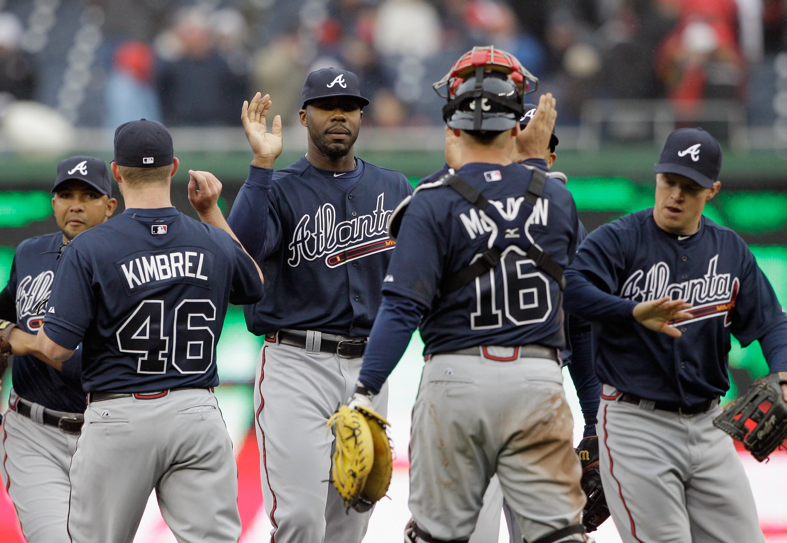 WASHINGTON, DC - MARCH 31: Jason Heyward #22 of the Atlanta Braves (C) celebrates after the game against the Washington Nationals at Nationals Park on March 31, 2011 in Washington, DC. The Braves defeated the Nationals 2-0.  (Photo by Rob Carr/Getty Image